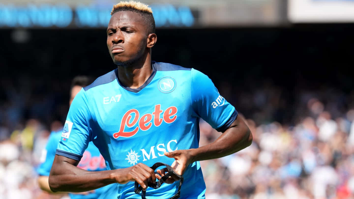 Victor Osimhen, bright blue Napoli jersey, stadium lights, HD Desktop Wallpaper