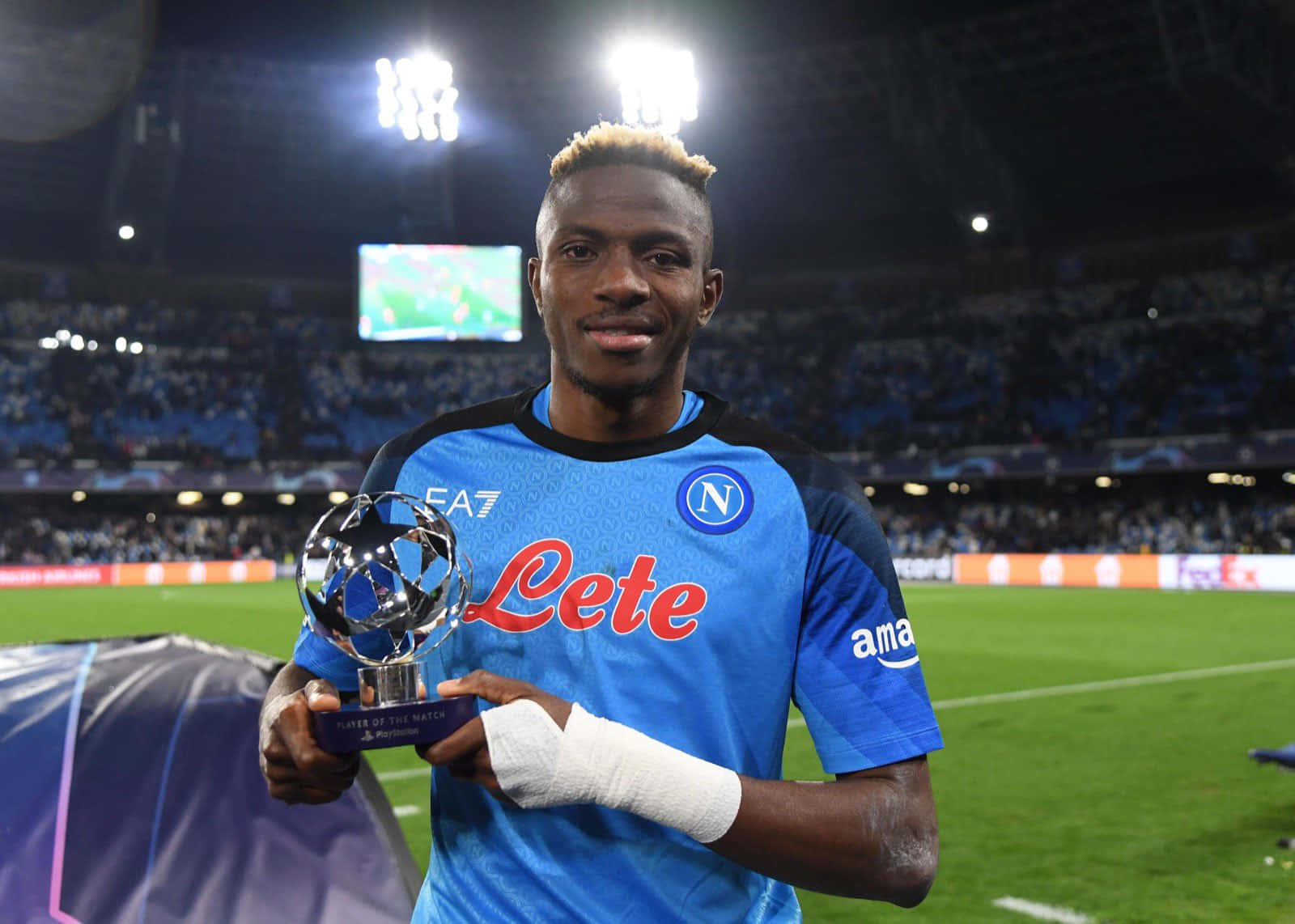 Victor Osimhen, blue Napoli jersey, Player of the Match trophy, HD Desktop Wallpaper