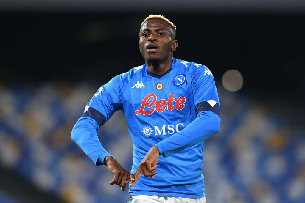 Victor Osimhen, blue Napoli jersey, stadium lights, SD Desktop Wallpaper