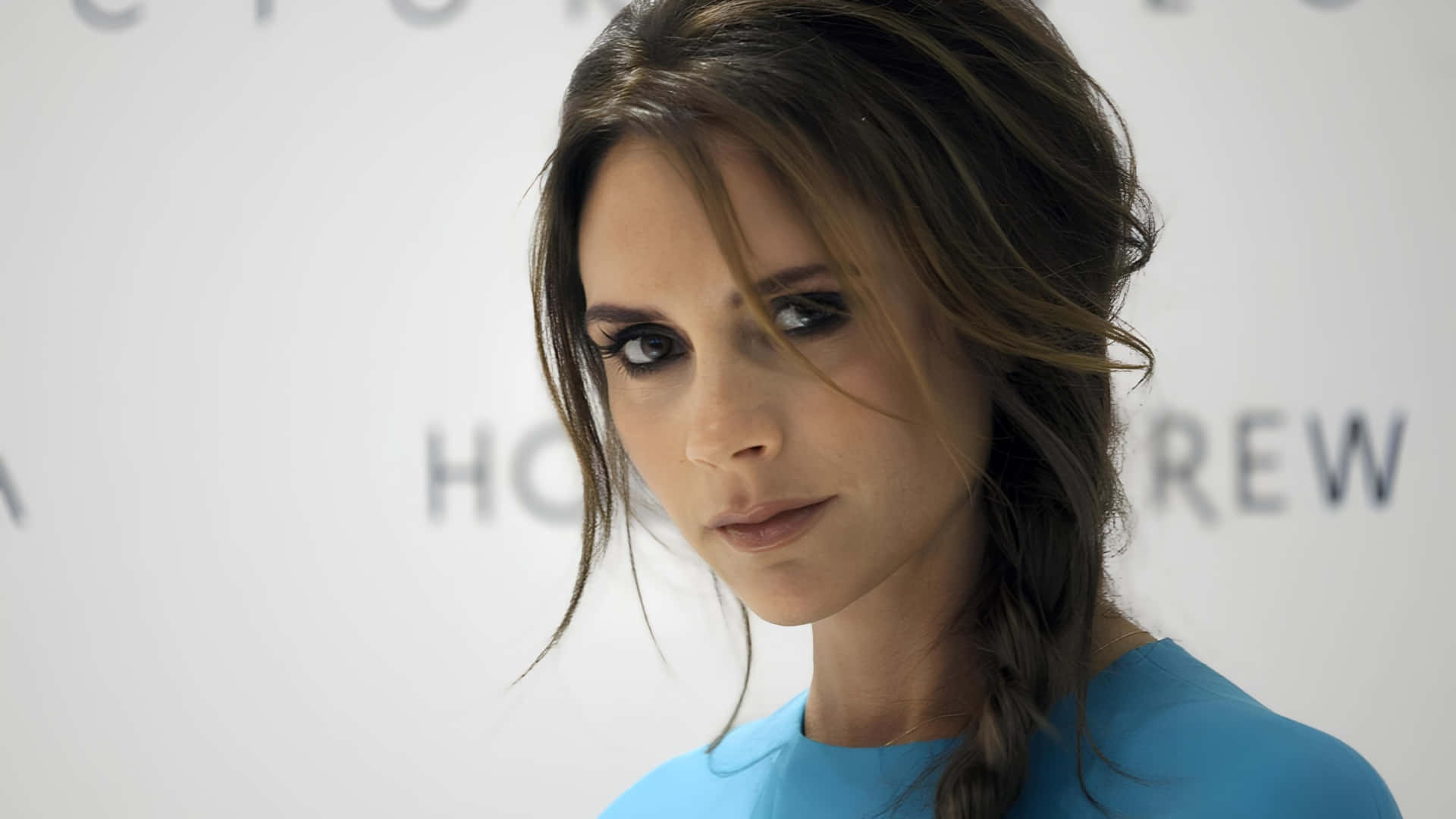 Victoria Beckham, blue top, white branded backdrop, Full HD Desktop Wallpaper