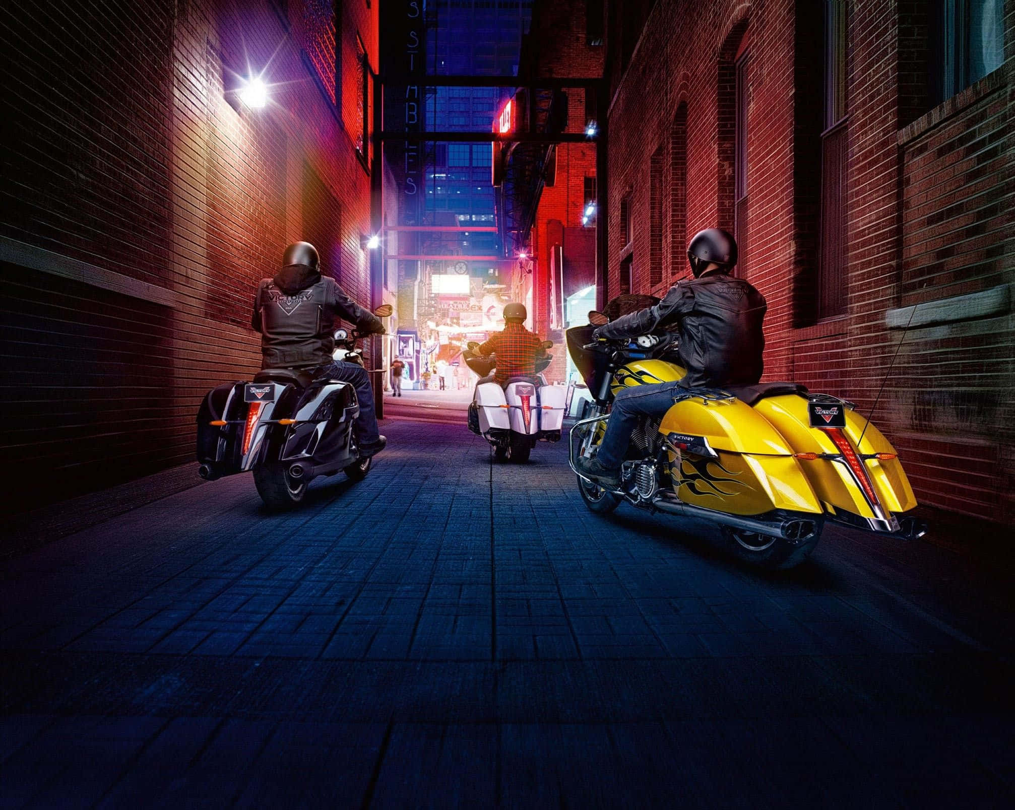 Victory Motorcycle, nighttime cityscape, neon-lit urban alley, Full HD Desktop Wallpaper