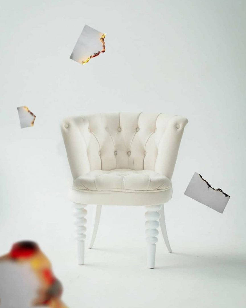 Vijay Mahar, white tufted armchair, torn paper fragments, SD Phone Wallpaper