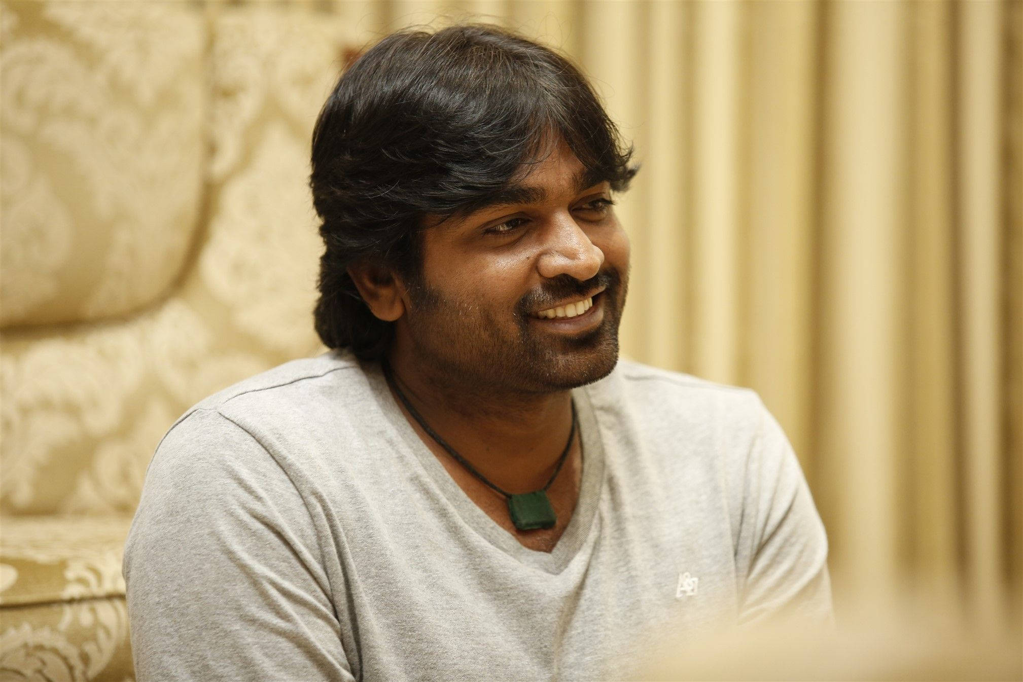 Vijay Sethupathi, gray shirt, patterned sofa, Full HD Desktop Wallpaper