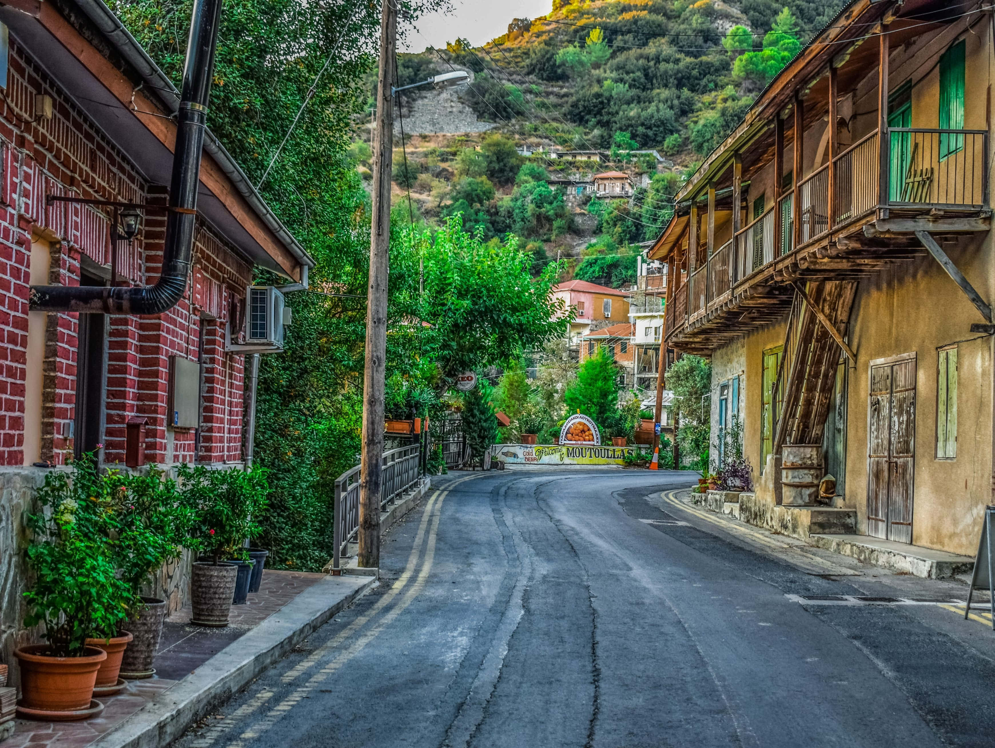 rural village, asphalt road, terraco-roofed houses, 2K Desktop Wallpaper