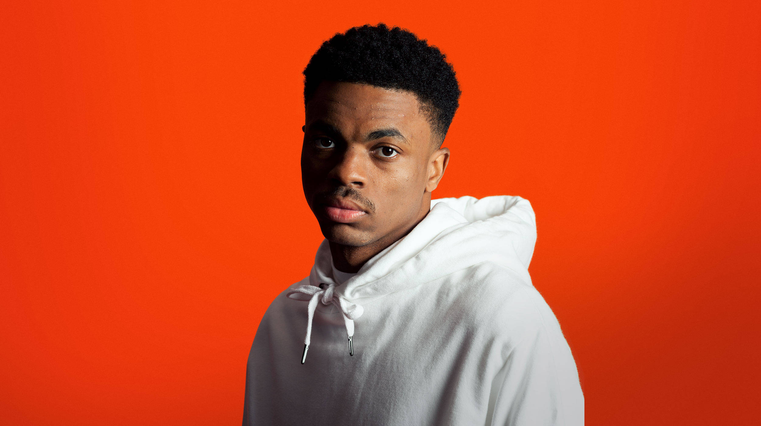 Vince Staples, white hoodie, bold orange studio background, Full HD Desktop Wallpaper