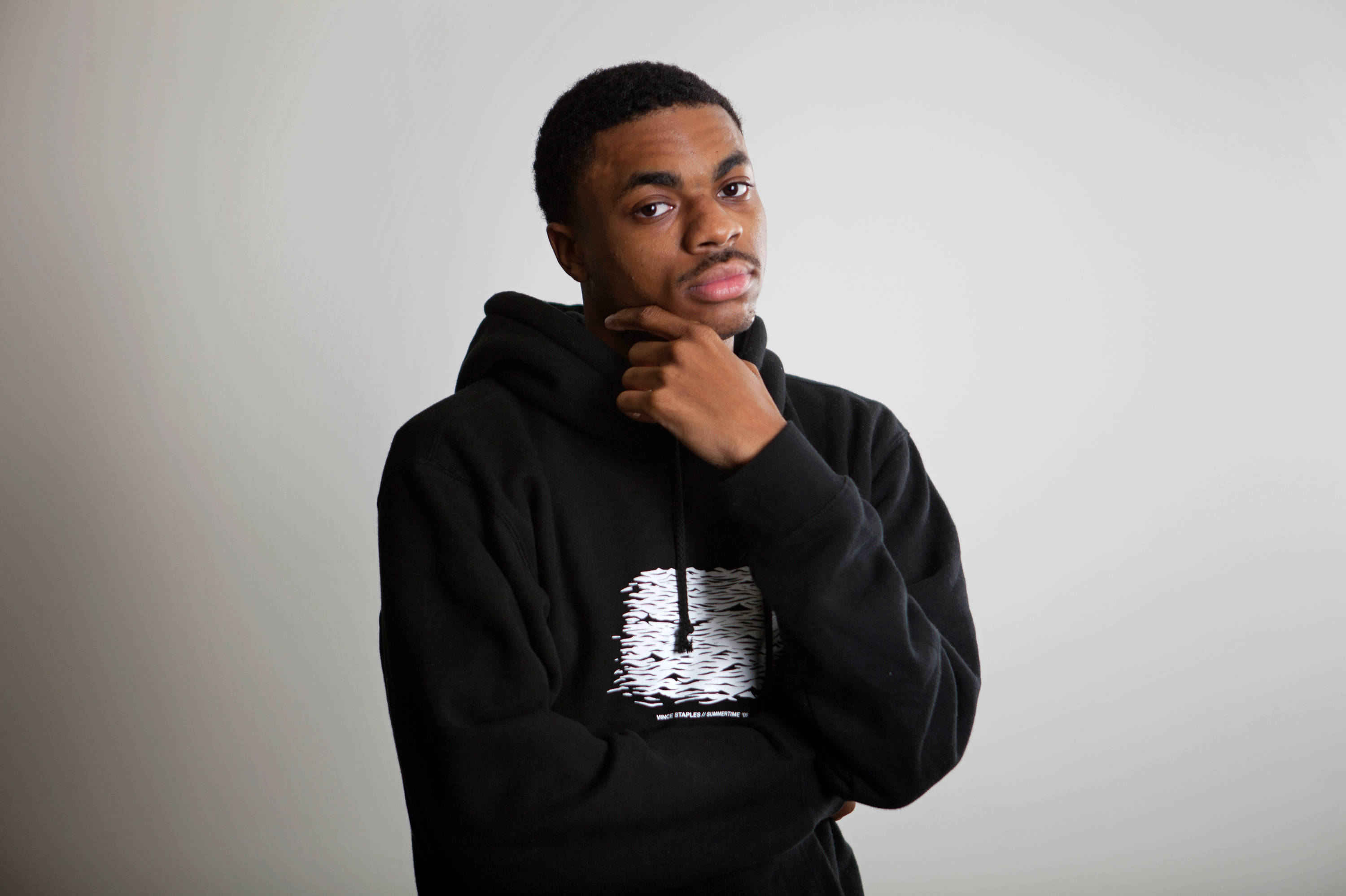 Vince Staples, black hoodie, white graphic, 2K Desktop Wallpaper