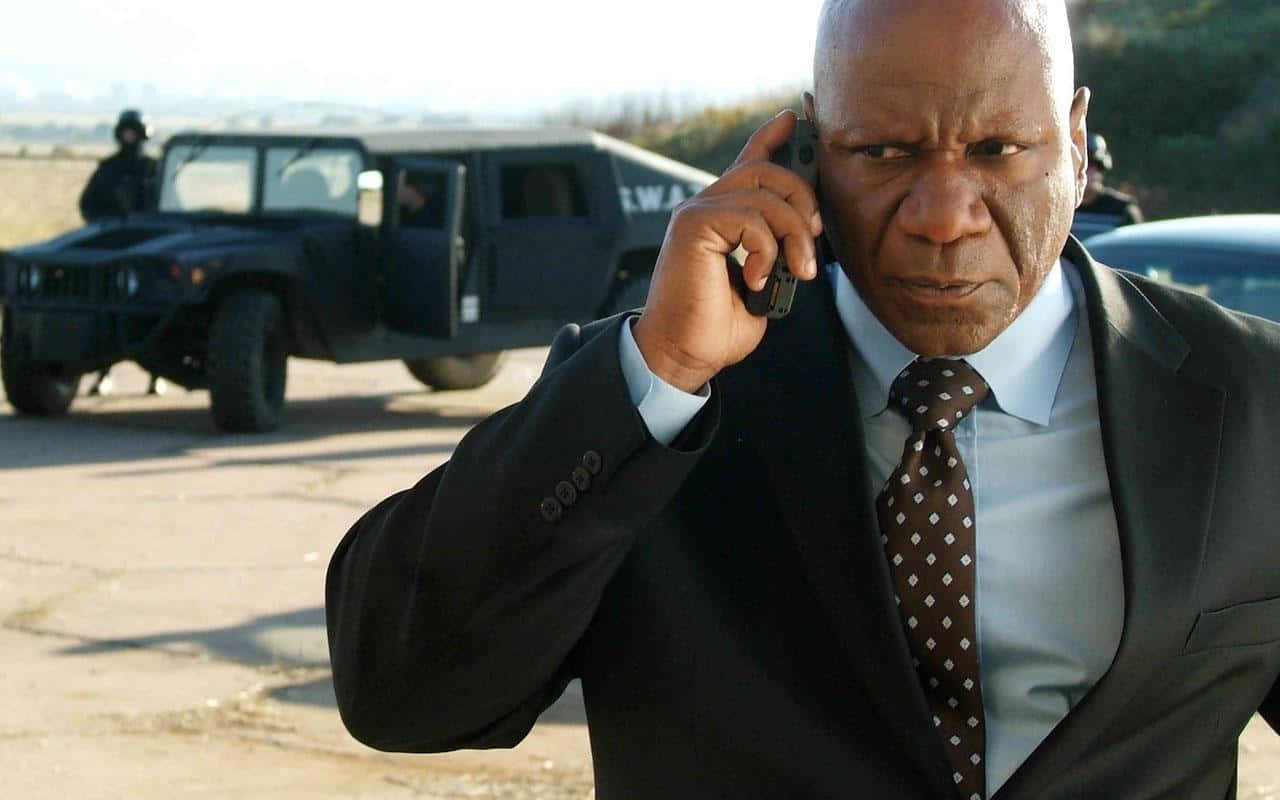Ving Rhames, suit, black military vehicle, HD Desktop Wallpaper