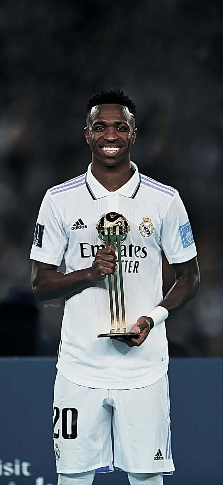 Vinicius Jr, white Real Madrid jersey, gleaming trophy, HD Phone Wallpaper