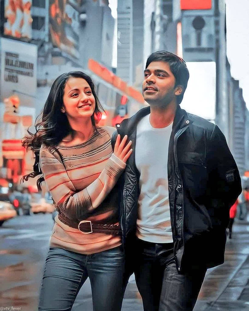 Vinnaithandi Varuvaya HD, bustling rainy city street, glowing billboards, SD Phone Wallpaper