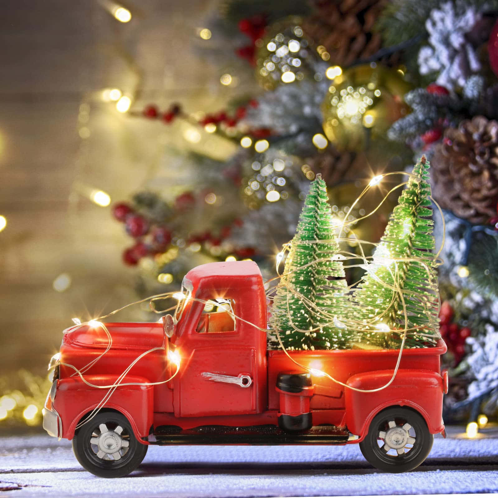 vintage red toy truck, glowing miniature Christmas trees, festive bokeh background, HD Desktop Wallpaper