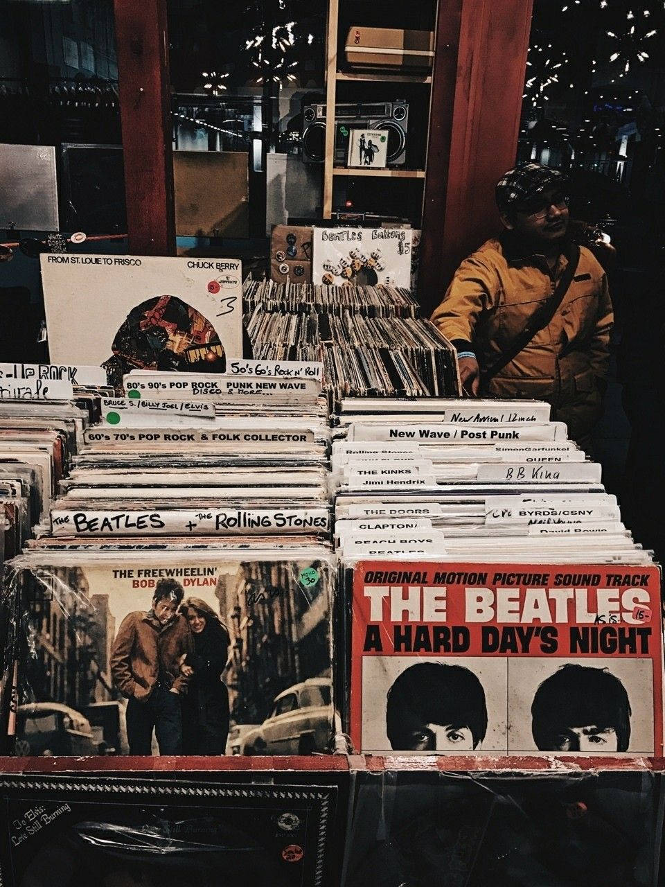 vintage record store, classic vinyl albums, warmly lit, HD Phone Wallpaper