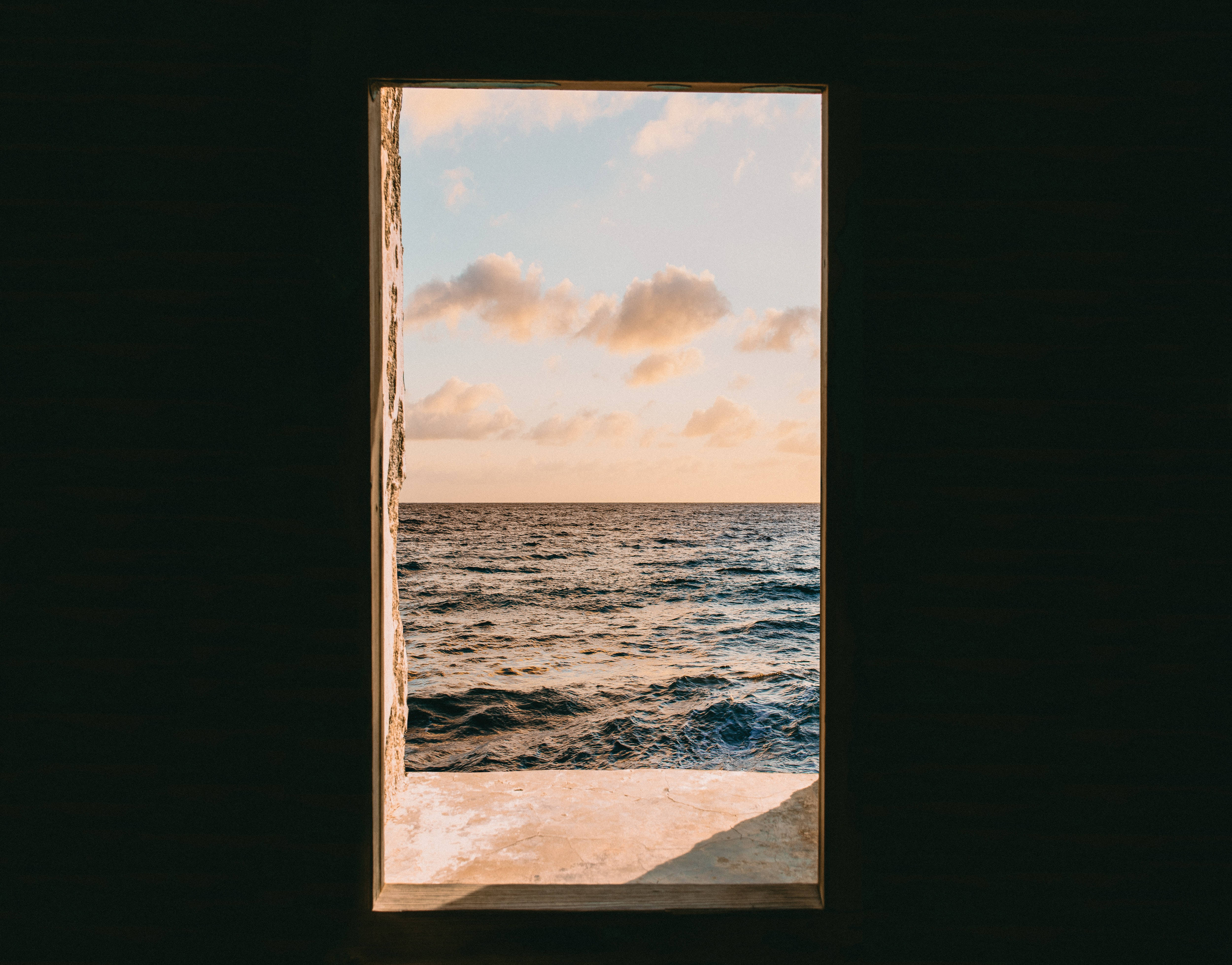 Vintage Aesthetic Clouds, sea window, golden hour, 4K Desktop Wallpaper