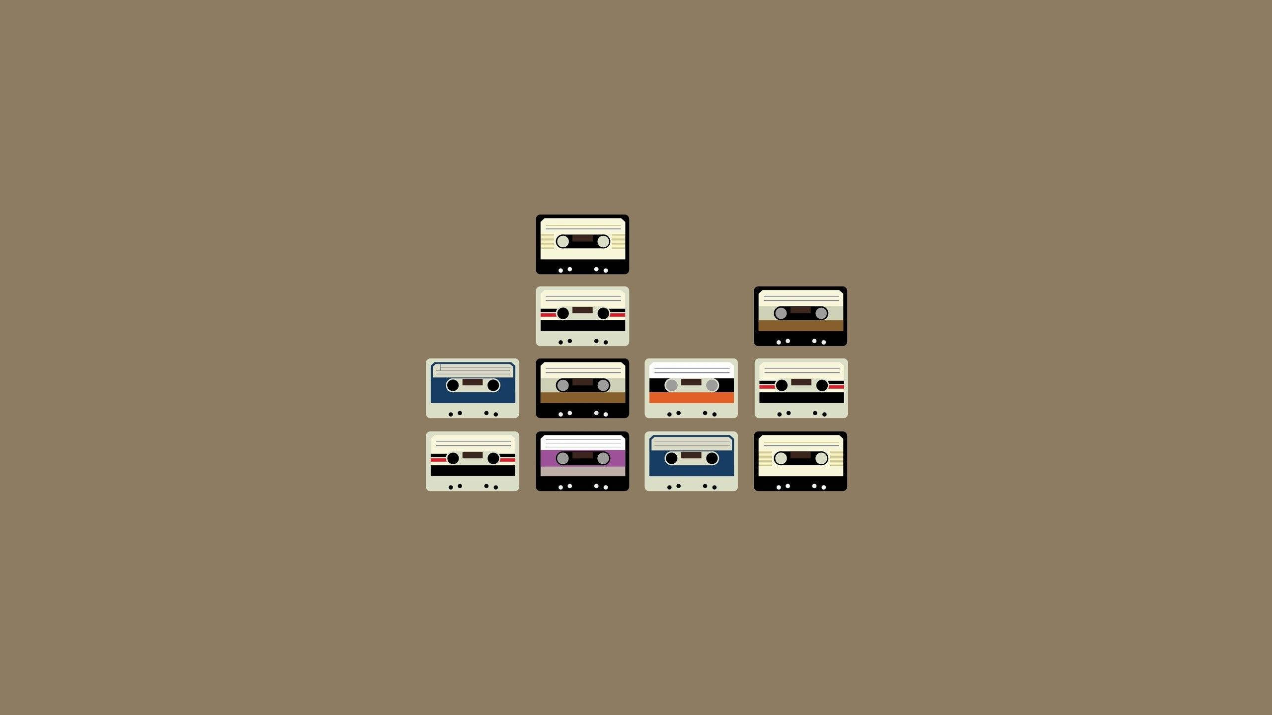 cassette tapes, colorful, solid brown background, 2K Desktop Wallpaper