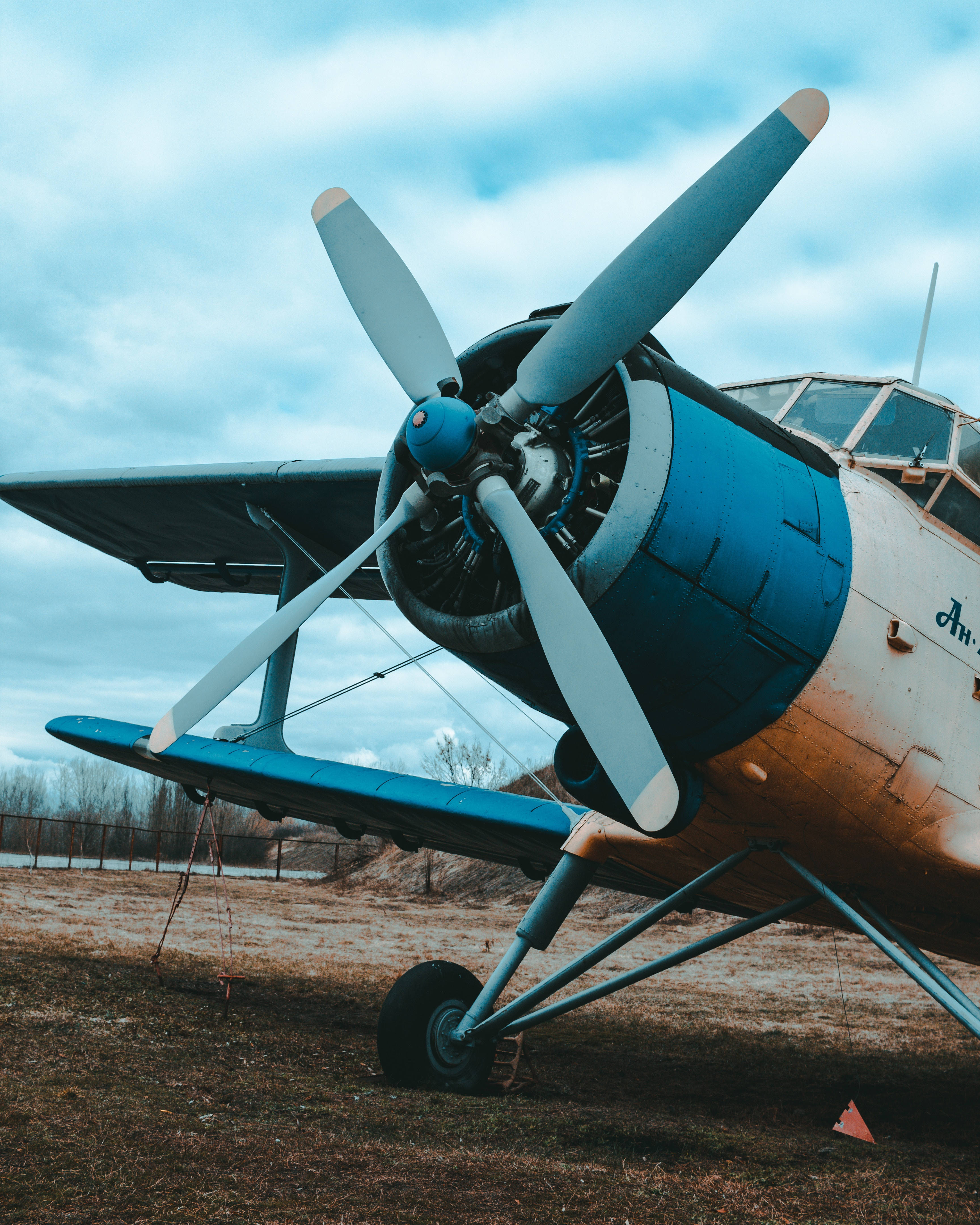 vintage airplane propeller, blue and white seaplane, dry grass, 4K Phone Wallpaper