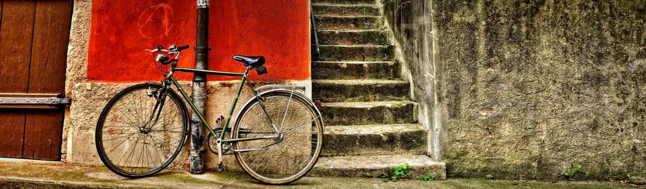 vintage green bicycle, weathered stone wall, vibrant red door, HD Desktop Wallpaper