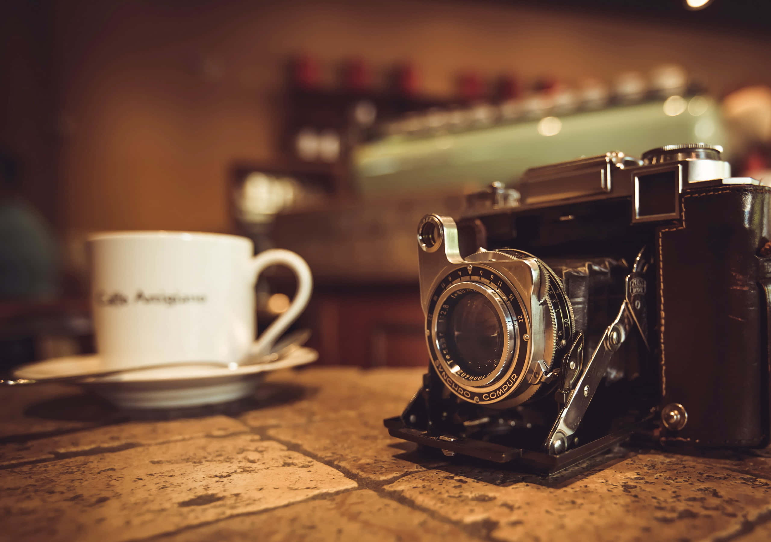 vintage camera, golden era, rustic tiled counter, 2K Desktop Wallpaper