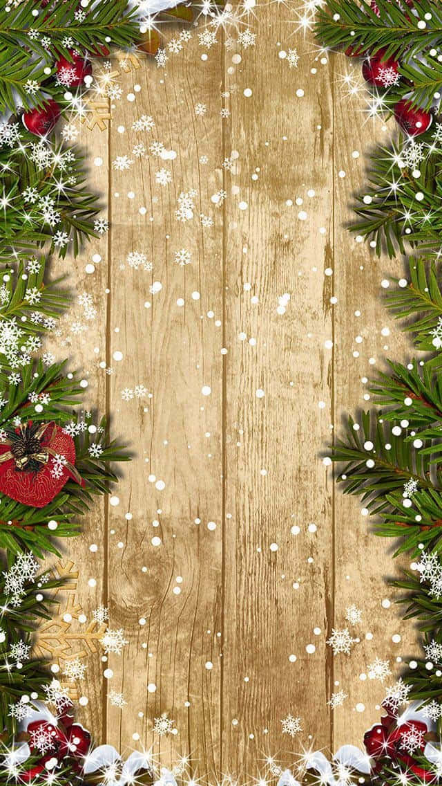 Vintage Christmas iPhone, rustic wooden background, evergreen branches, SD Phone Wallpaper