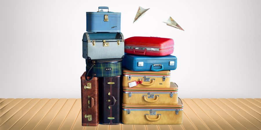 stacked vintage suitcases, blue red and brown, wooden floor, SD Desktop Wallpaper