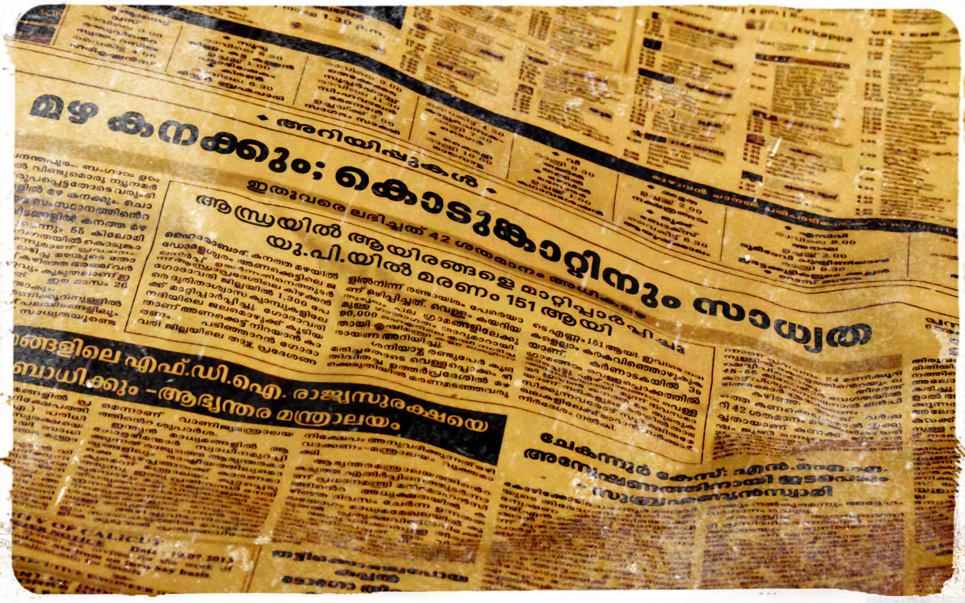 vintage newspaper, yellowed, Malayalam text, 4K Desktop Wallpaper