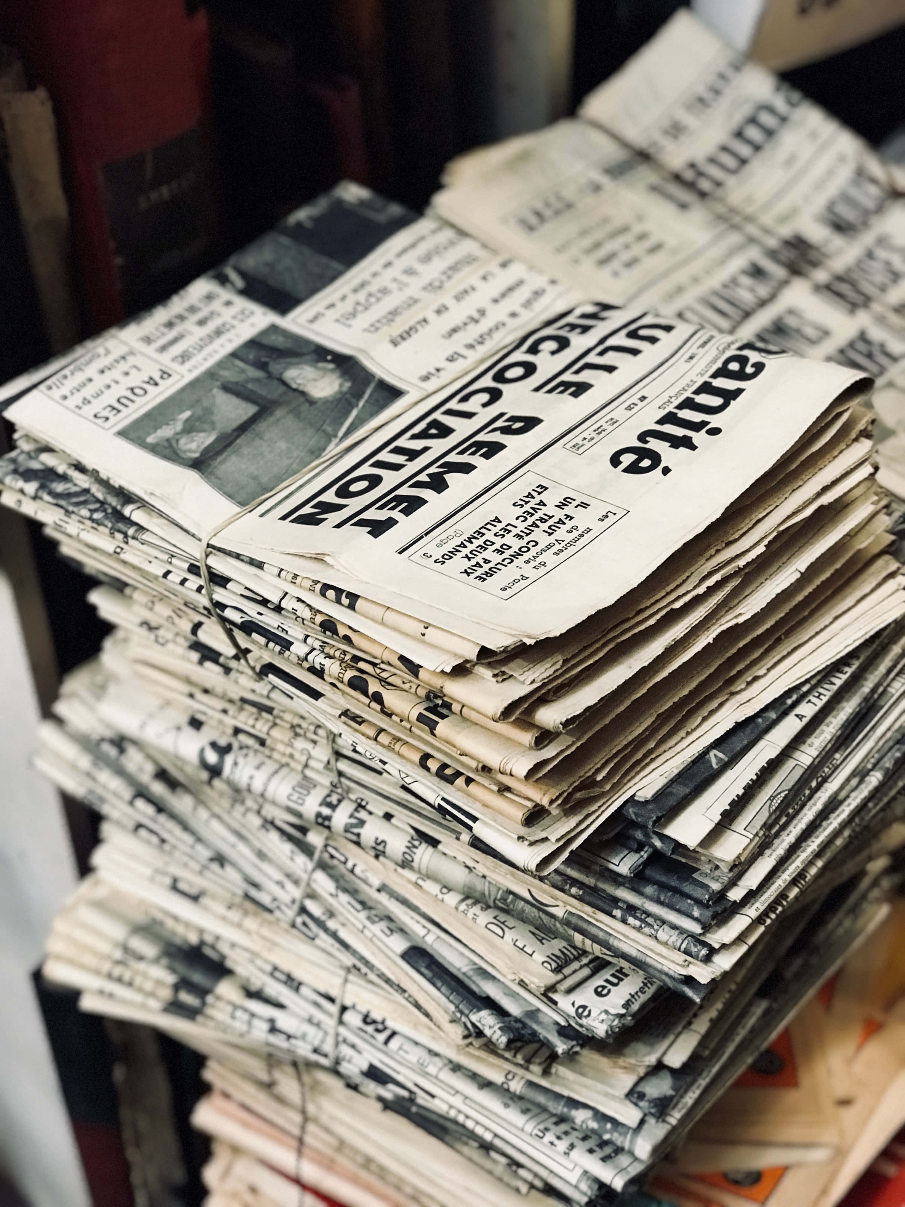 vintage newspapers, frayed edges, bold headlines, 4K Phone Wallpaper