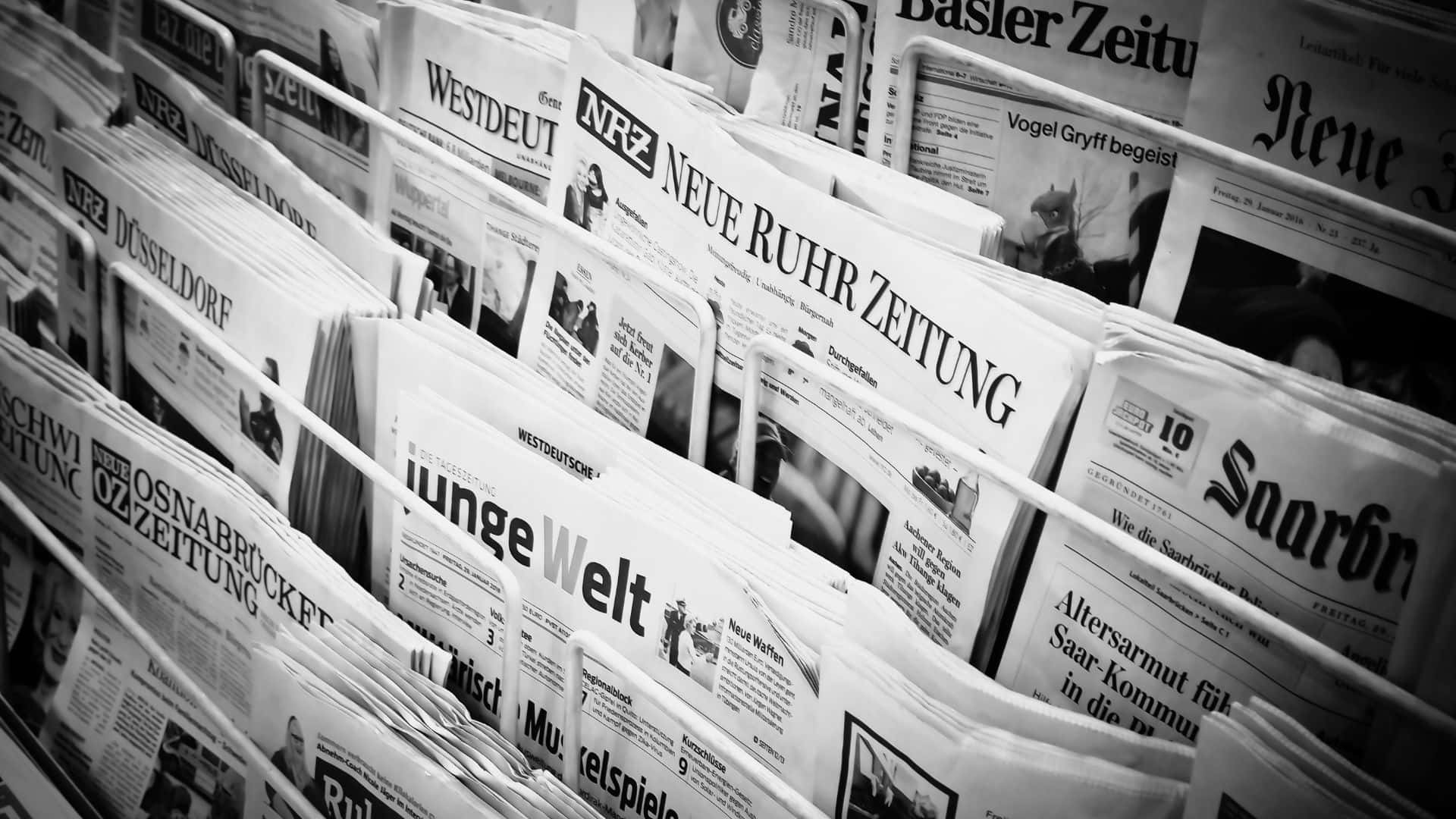 black and white newspaper, German newspapers, stacked in a rack, Full HD Desktop Wallpaper