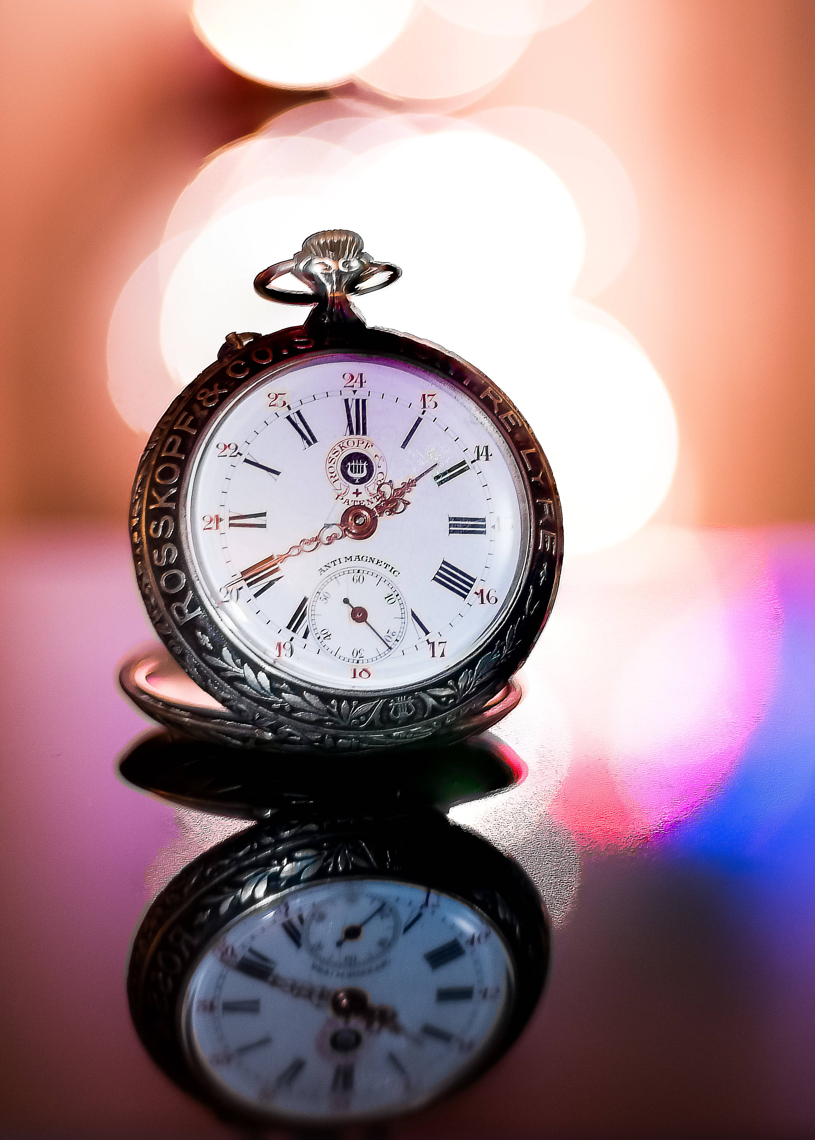 silver pocket watch, Roman numerals, reflective surface, 2K Phone Wallpaper