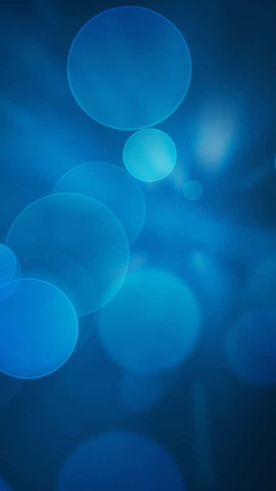 Wildflower meadows, soft glowing blue circles, dreamy gradient background, SD Phone Wallpaper