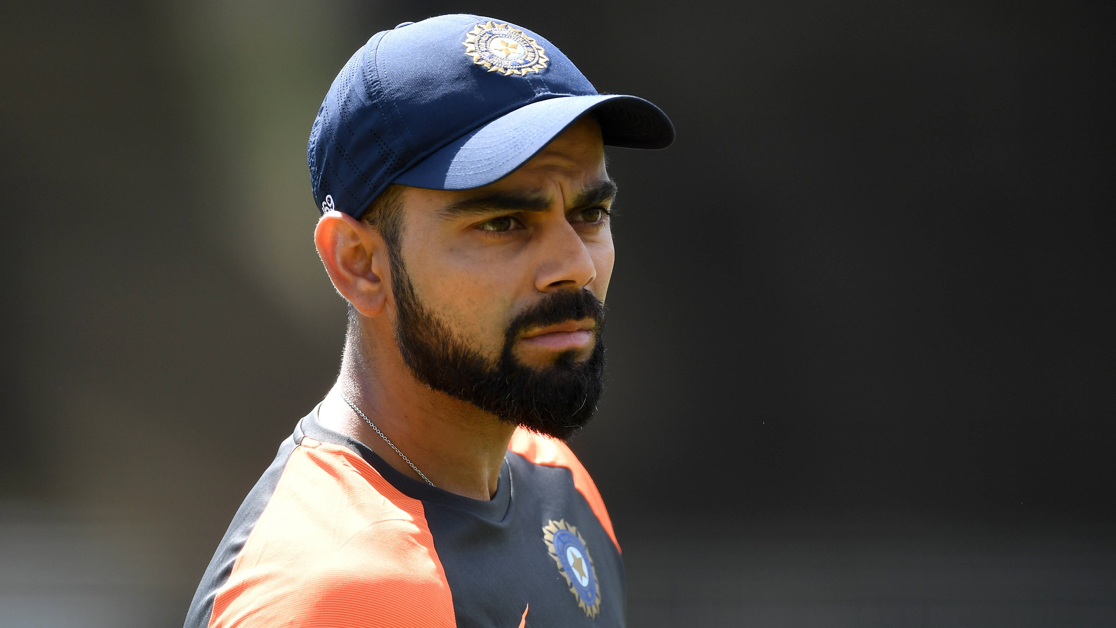 Virat Kohli, blue cap, orange jersey, 4K Desktop Wallpaper