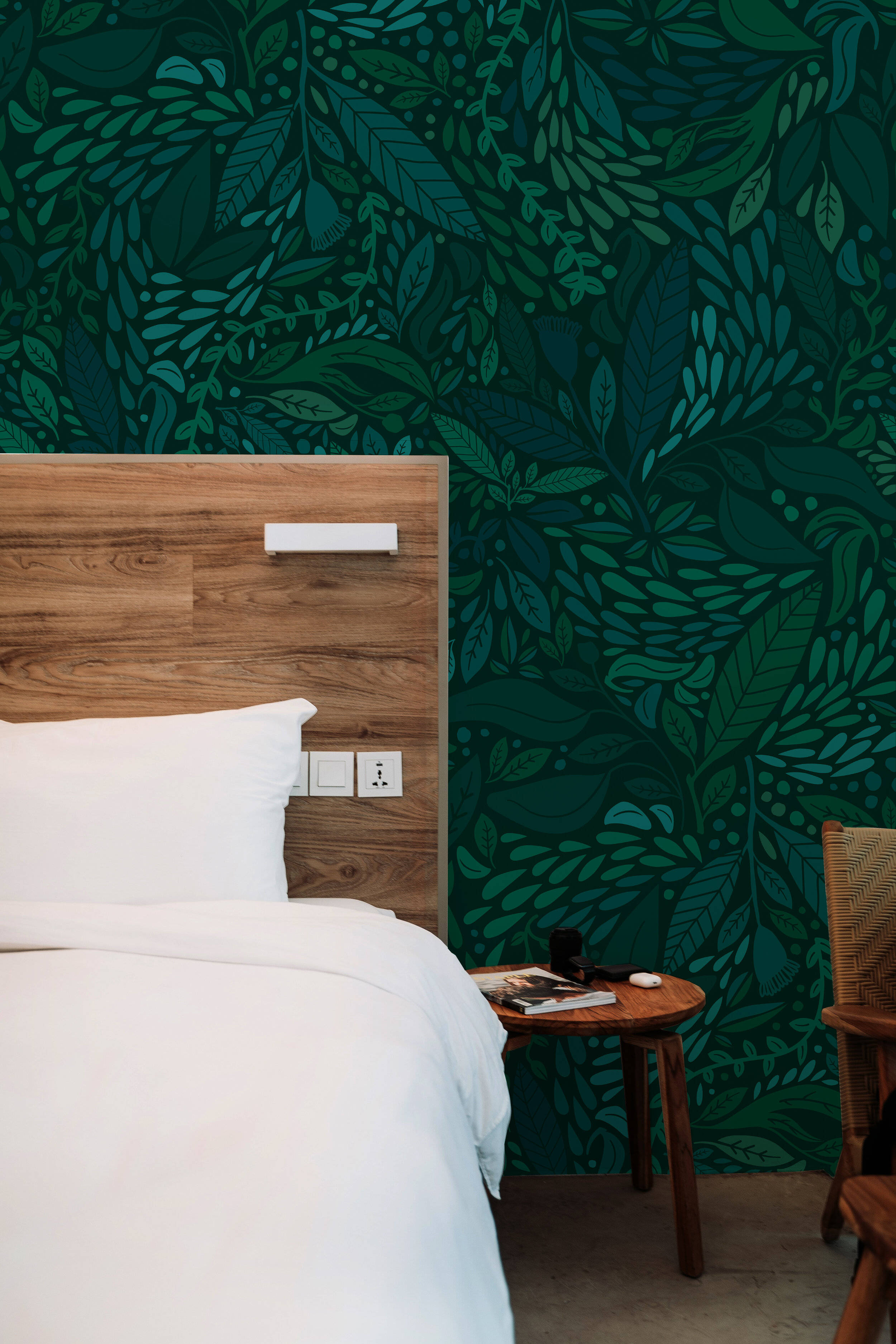 Viridian, wooden bed, vibrant green leaf-patterned wallpaper, 2K Phone Wallpaper