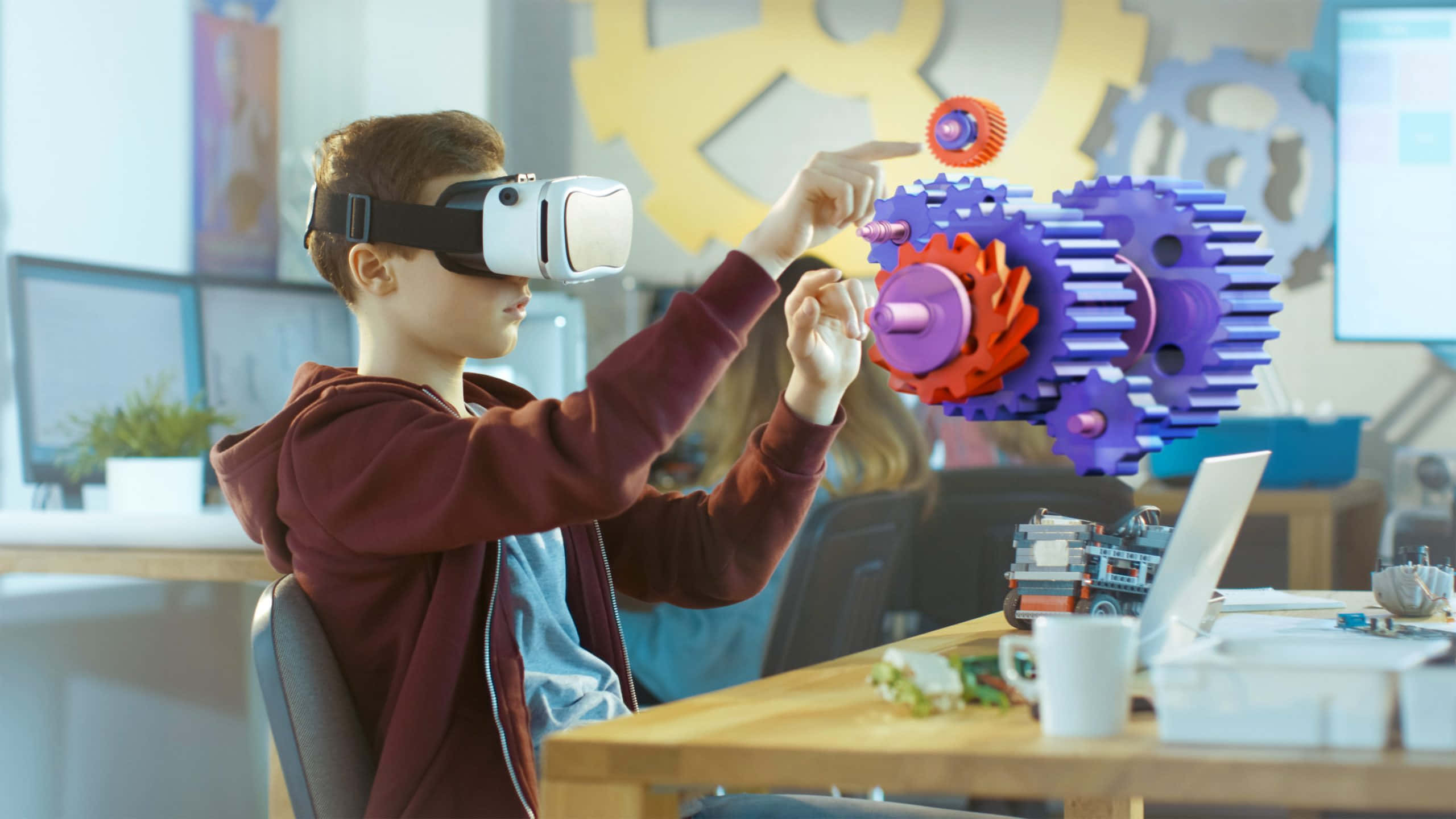 virtual reality headset, floating colorful gears, maroon hoodie, 2K Desktop Wallpaper