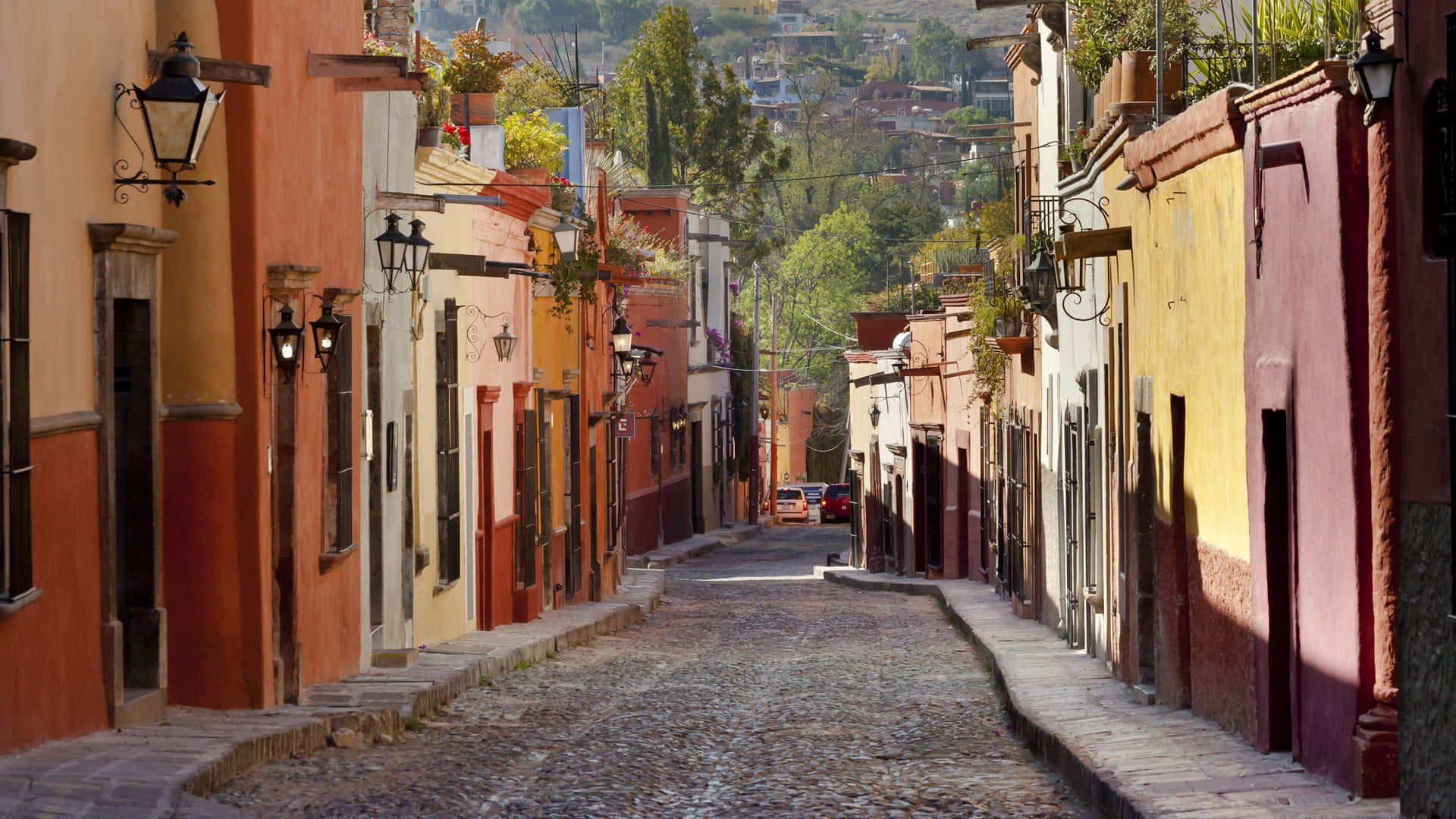 cobblestone street, colorful colonial buildings, hanging plants, Full HD Desktop Wallpaper