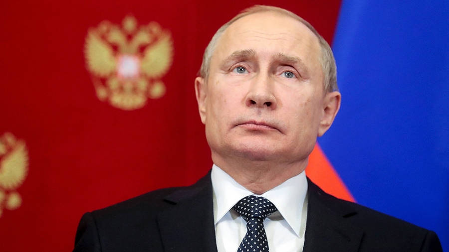 Vladimir Putin, dark suit and tie, red backdrop, SD Desktop Wallpaper