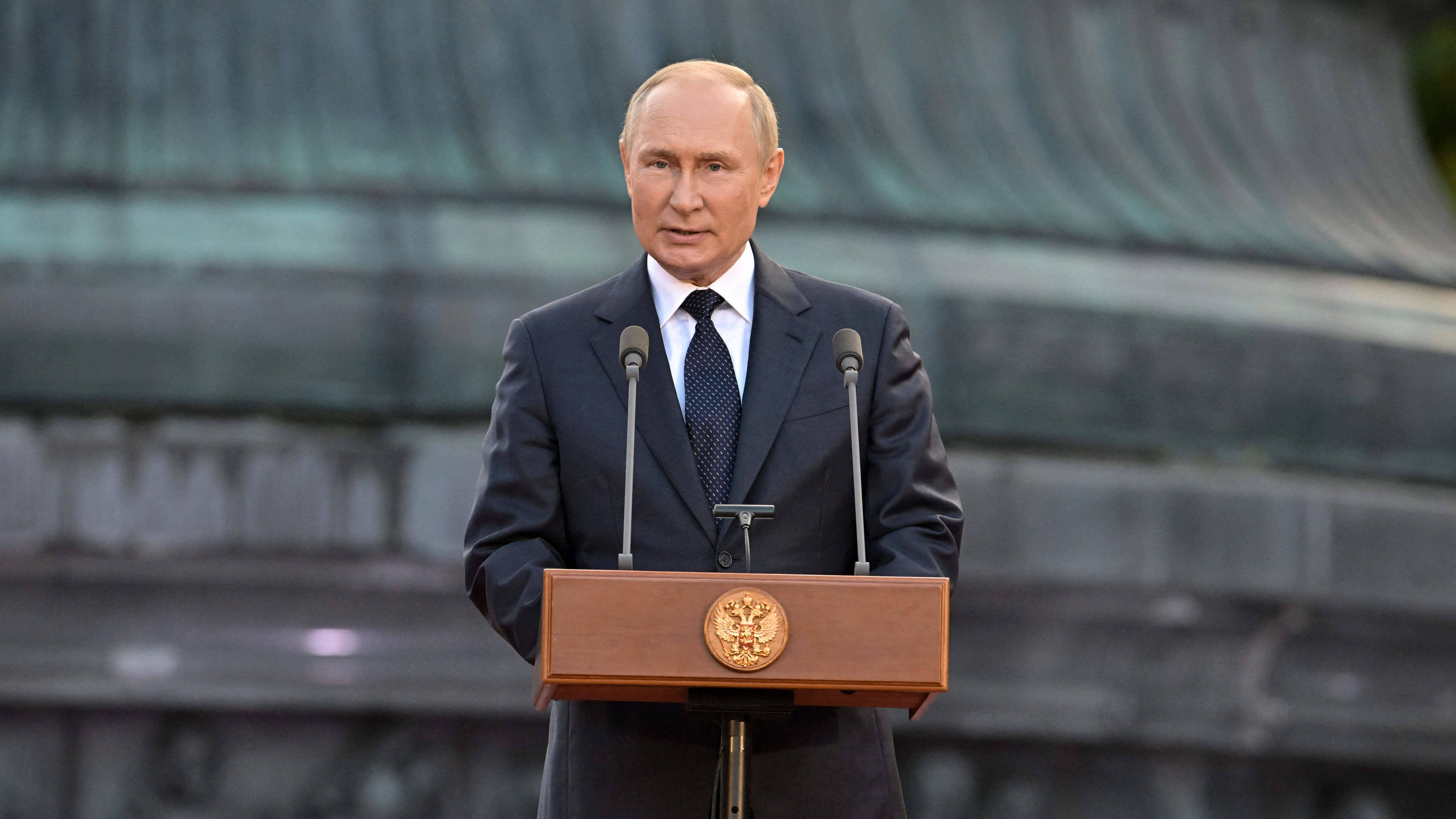 Vladimir Putin, dark suit, wooden podium, 8K Desktop Wallpaper