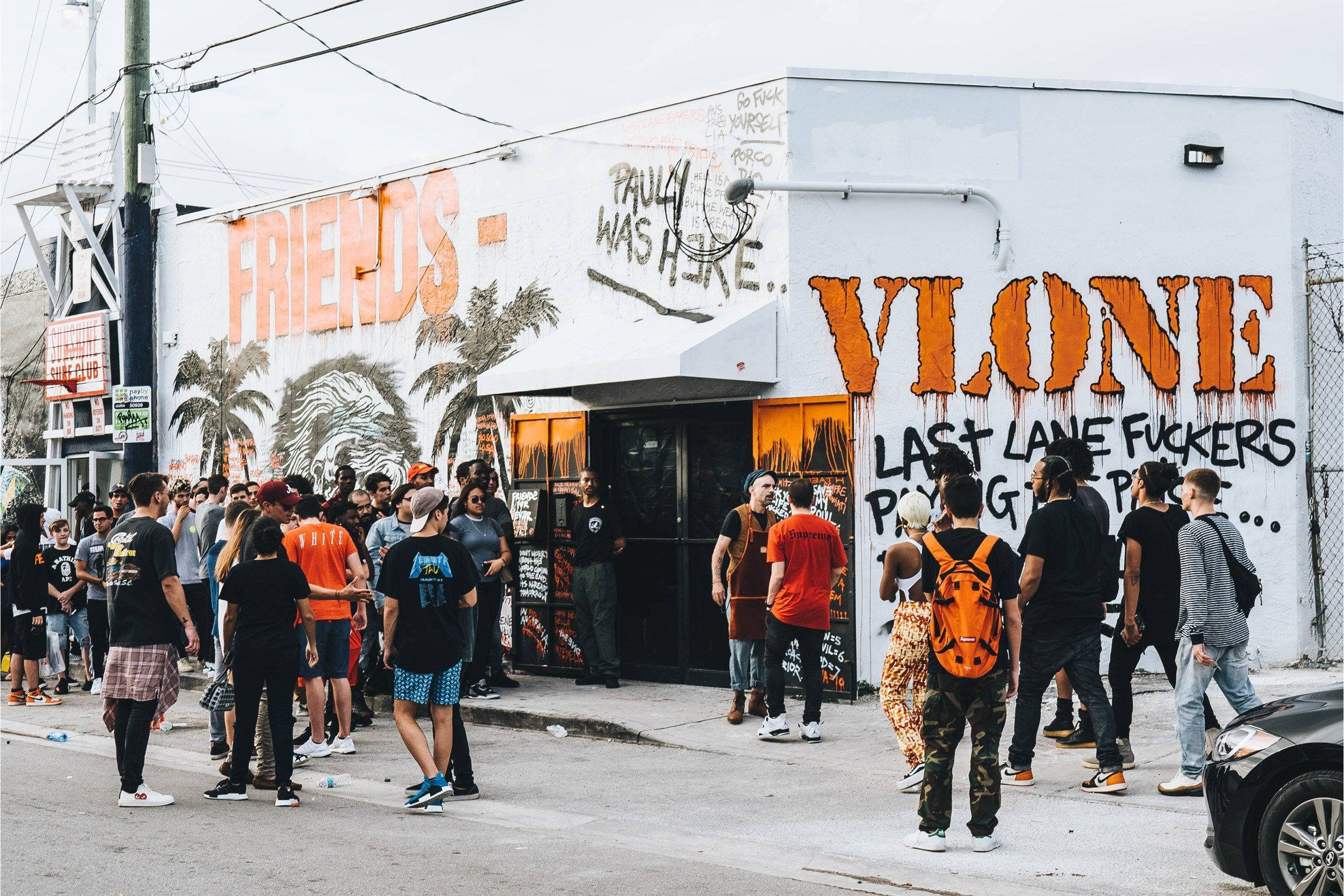 VLONE, orange and black street art, graffiti-covered building, Full HD Desktop Wallpaper