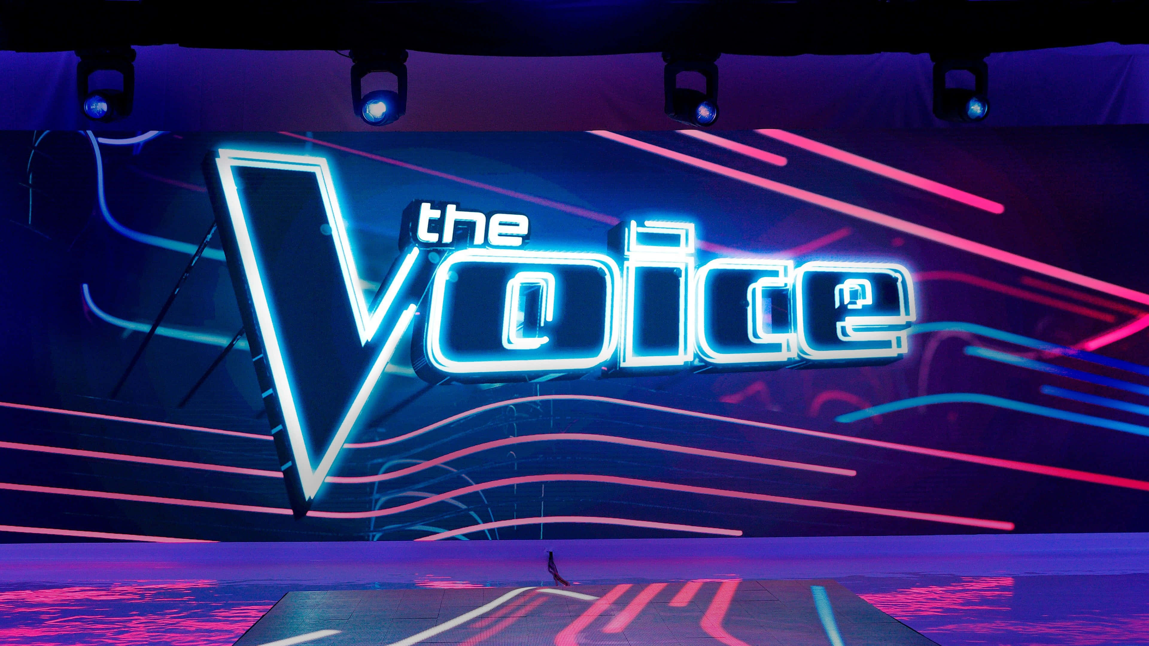 The Voice, neon-lit stage, pink and blue light streaks, 4K Desktop Wallpaper