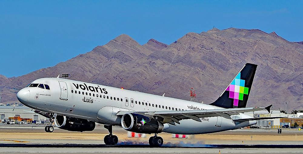 Volaris, runway, rugged brown mountains, SD Desktop Wallpaper