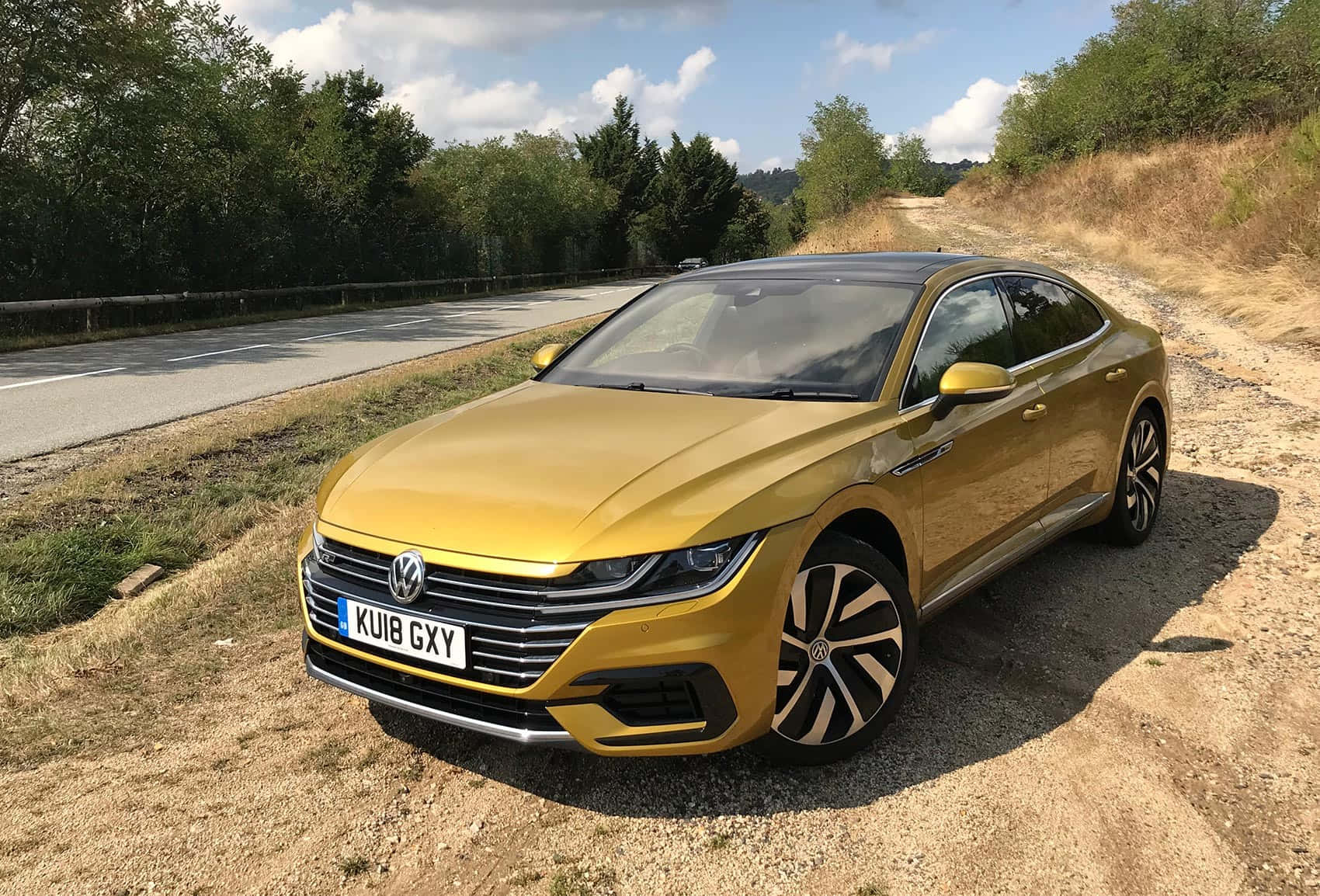 Volkswagen Arteon, gold, gravel roadside, HD Desktop Wallpaper