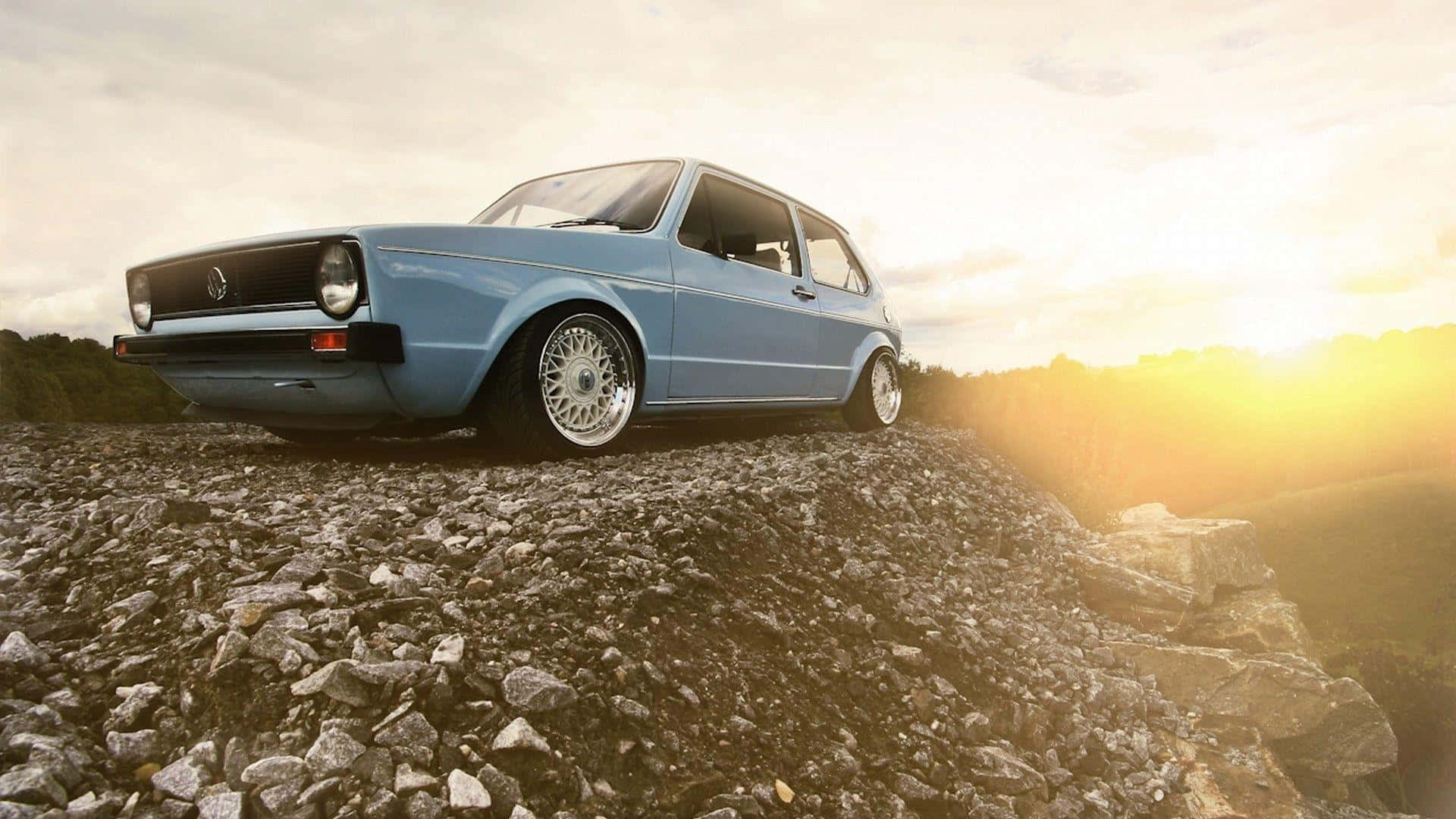 Volkswagen Golf, light blue, rocky hillside, Full HD Desktop Wallpaper