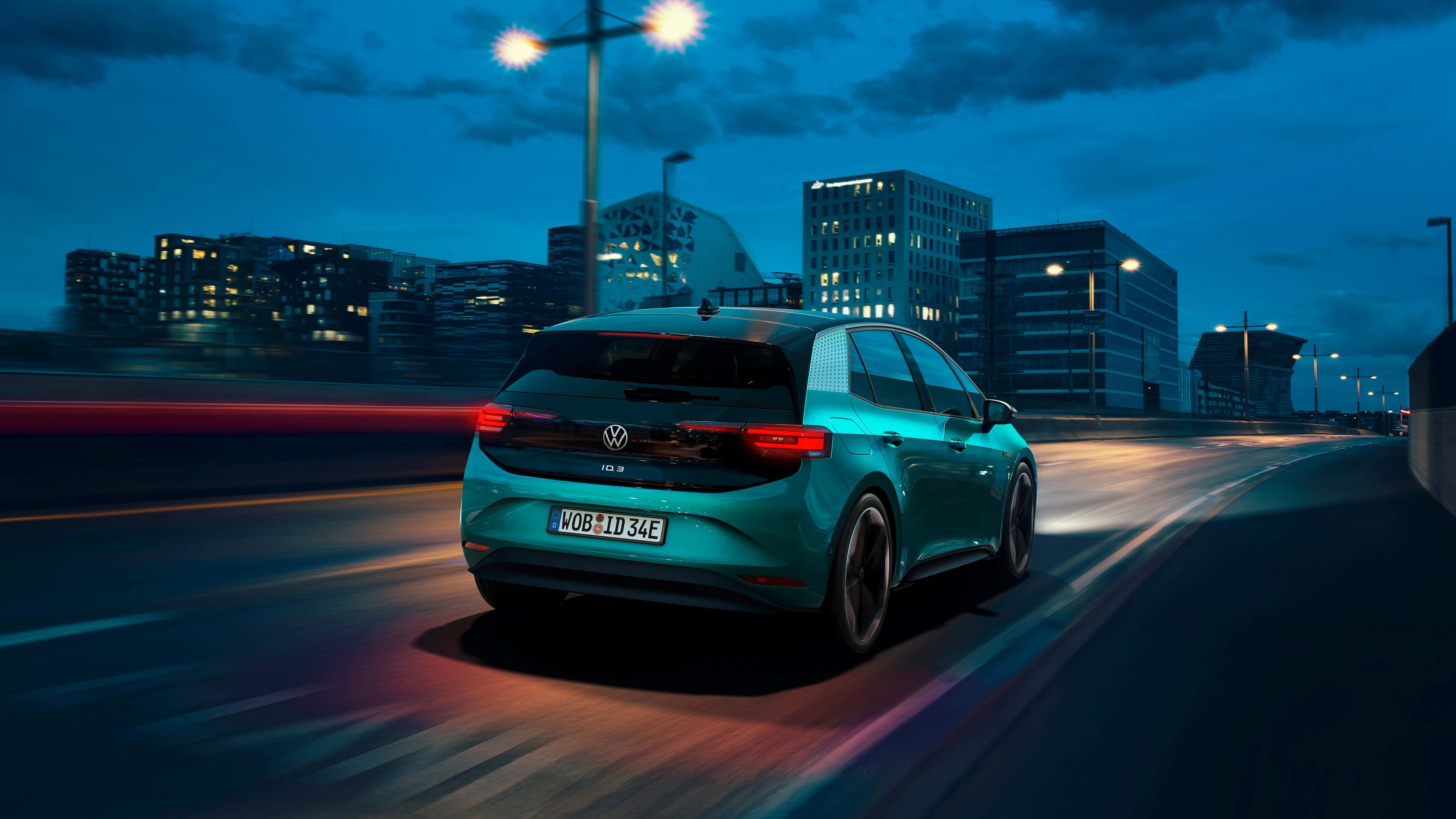 Volkswagen ID.4, teal, city at night, 5K Desktop Wallpaper