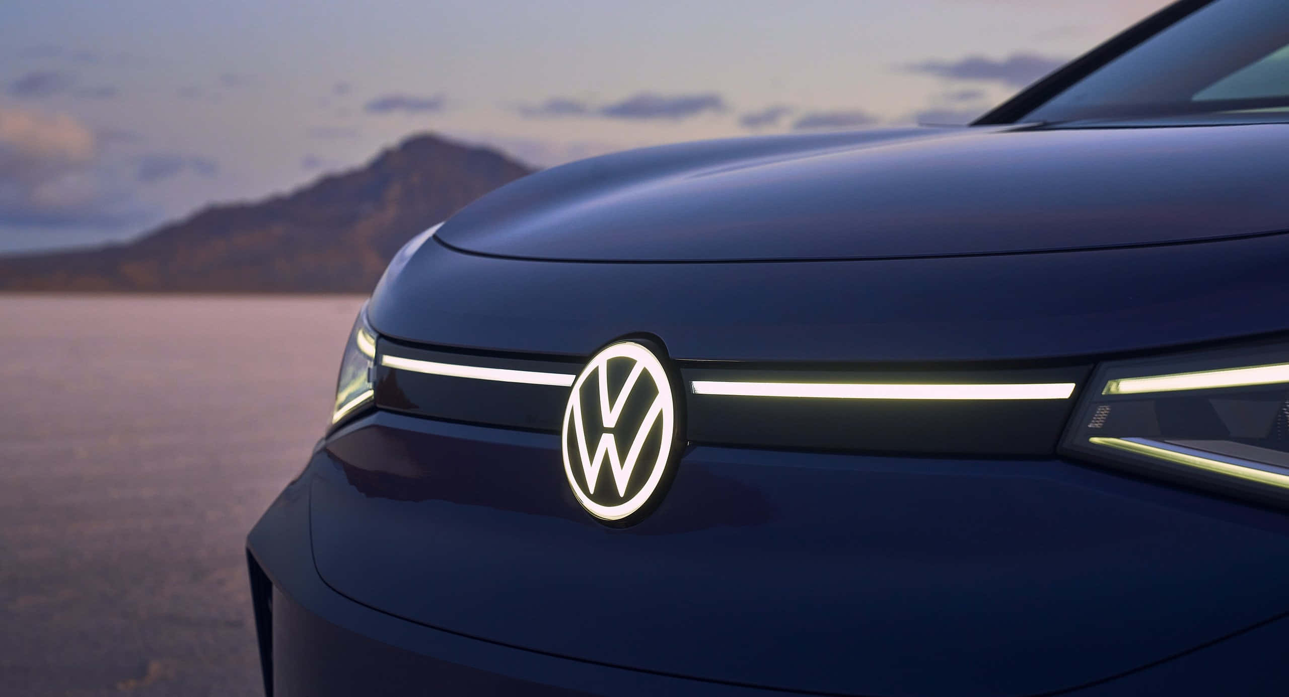 Volkswagen ID 4, dark blue, illuminated headlights, 2K Desktop Wallpaper
