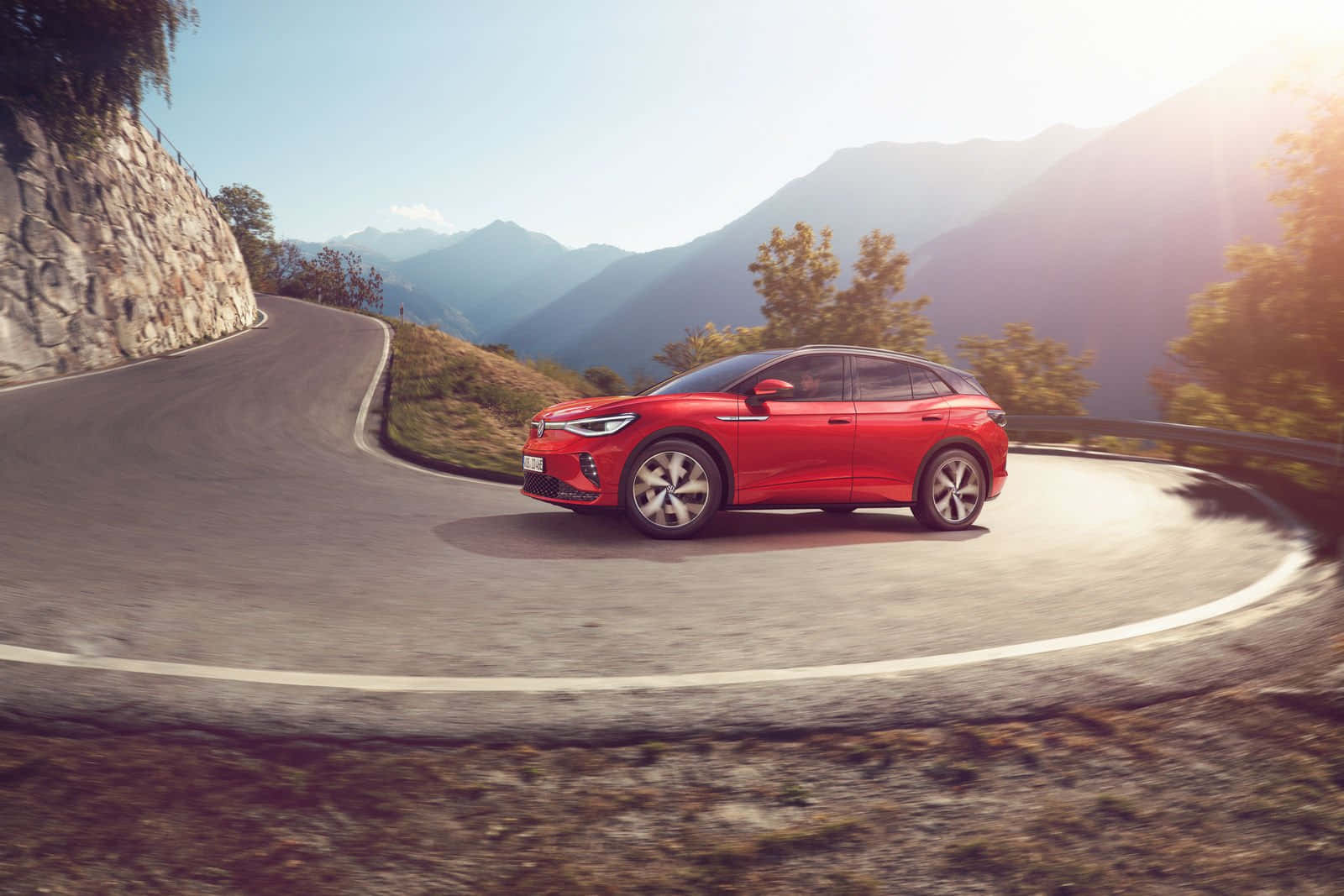 Volkswagen ID 4, vibrant red, winding mountain road, HD Desktop Wallpaper