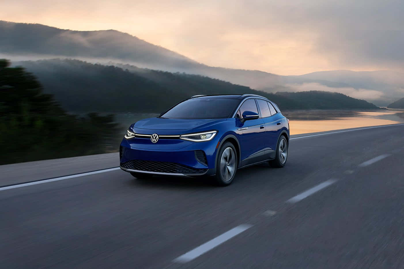 Volkswagen ID 4, sleek blue electric SUV, winding road, HD Desktop Wallpaper