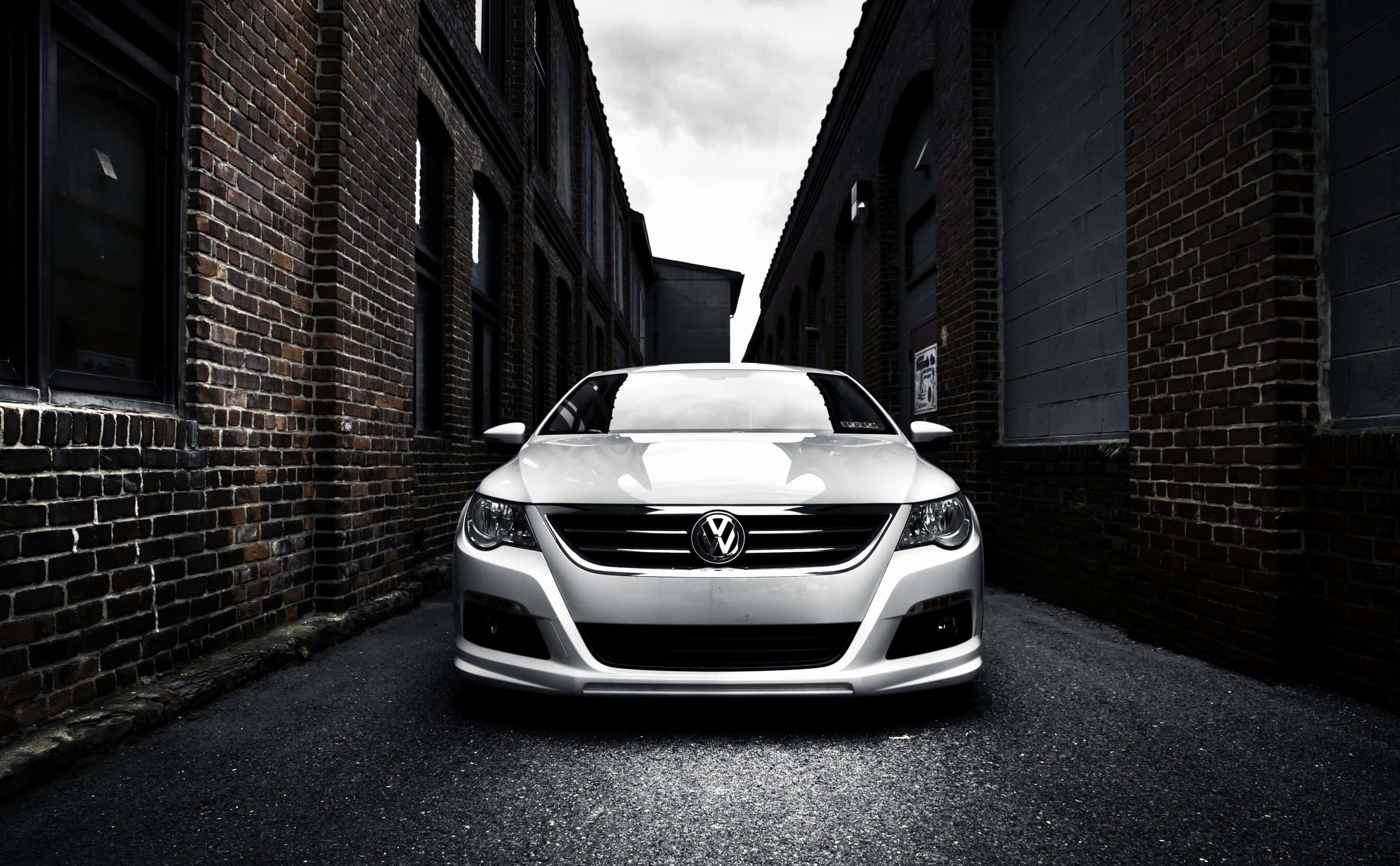 Volkswagen Passat CC, sleek silver, narrow brick alleyway, 2K Desktop Wallpaper