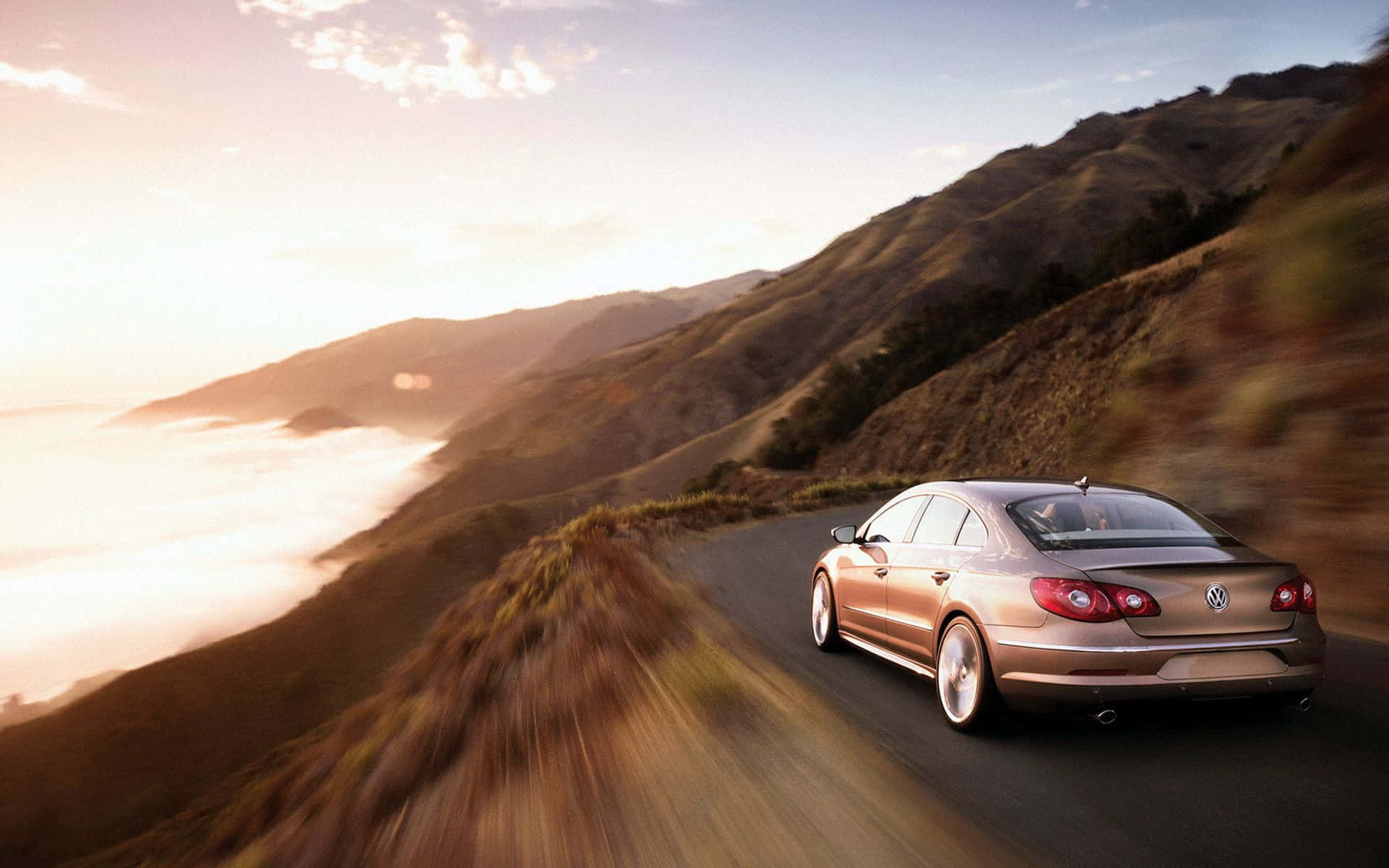 Volkswagen Passat CC, gold sedan, winding coastal mountain road, Full HD Desktop Wallpaper