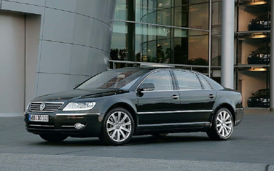 Volkswagen Phaeton, sleek black, modern glass and steel building, SD Desktop Wallpaper