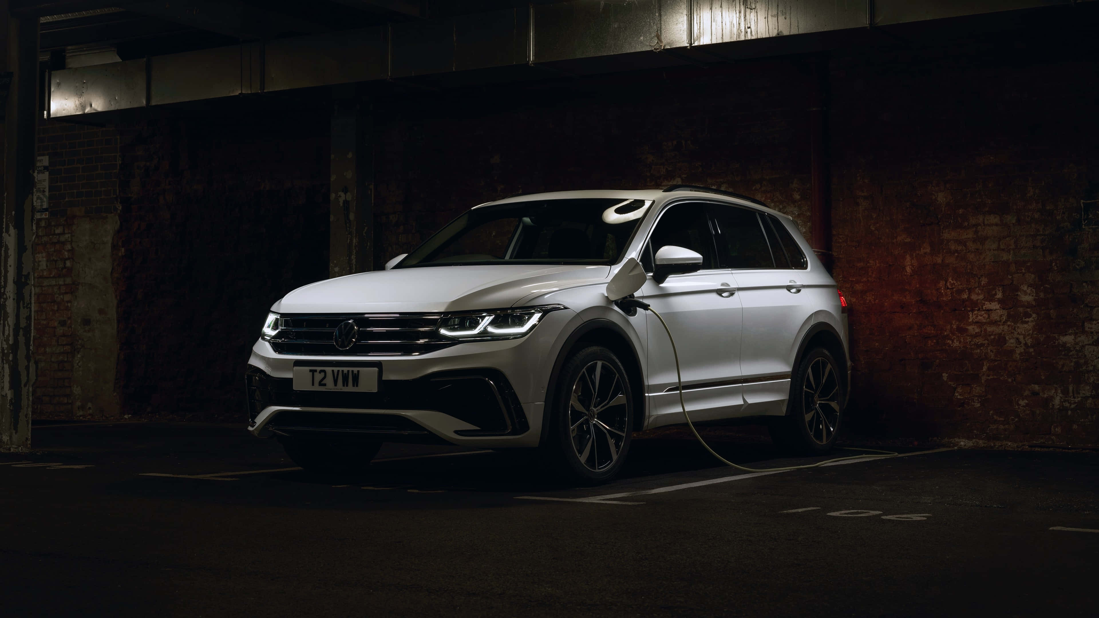 Volkswagen Tiguan, electric SUV, plugged in and charging, 4K Desktop Wallpaper