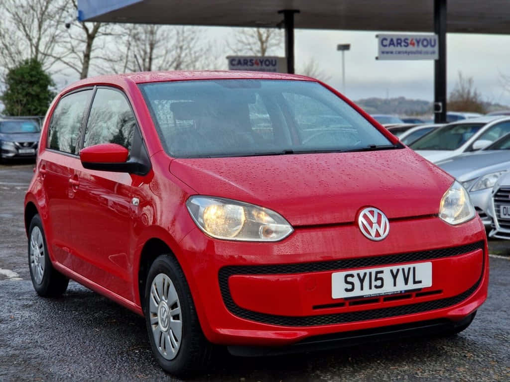 Red Volkswagen Up, Volkswagen Up, wet car dealership lot, SD Desktop Wallpaper