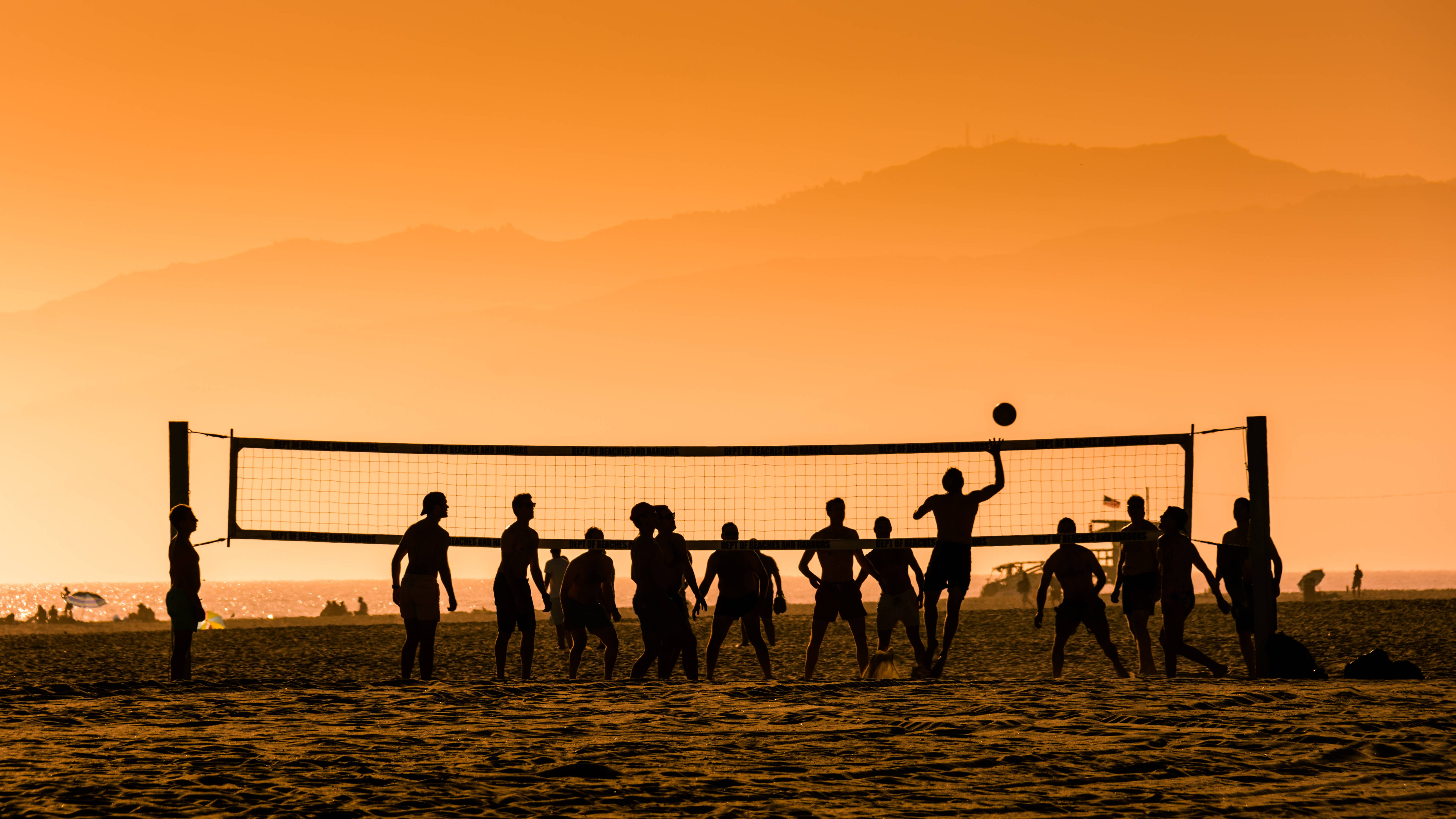 silhouette, beach volleyball players, fiery orange sunset, 5K Desktop Wallpaper
