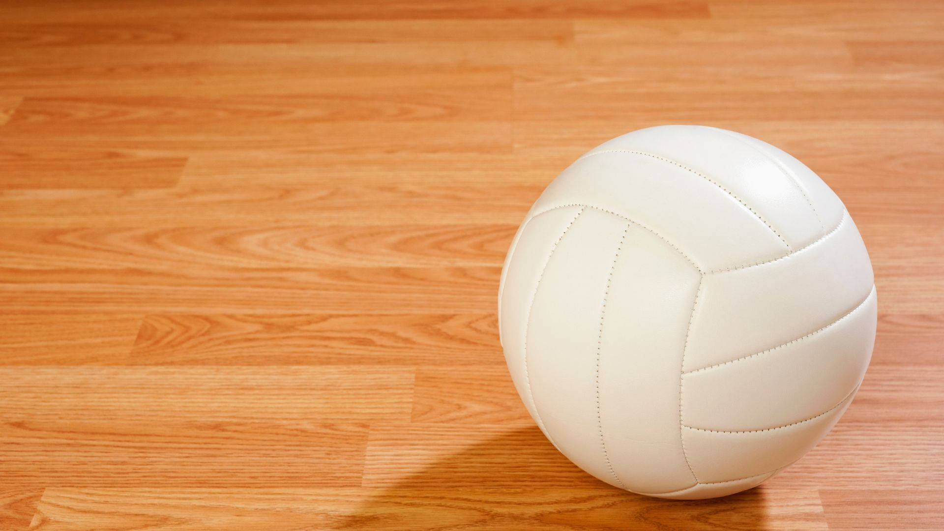 volleyball aesthetic, pristine white volleyball, warm-toned wooden gym floor, Full HD Desktop Wallpaper