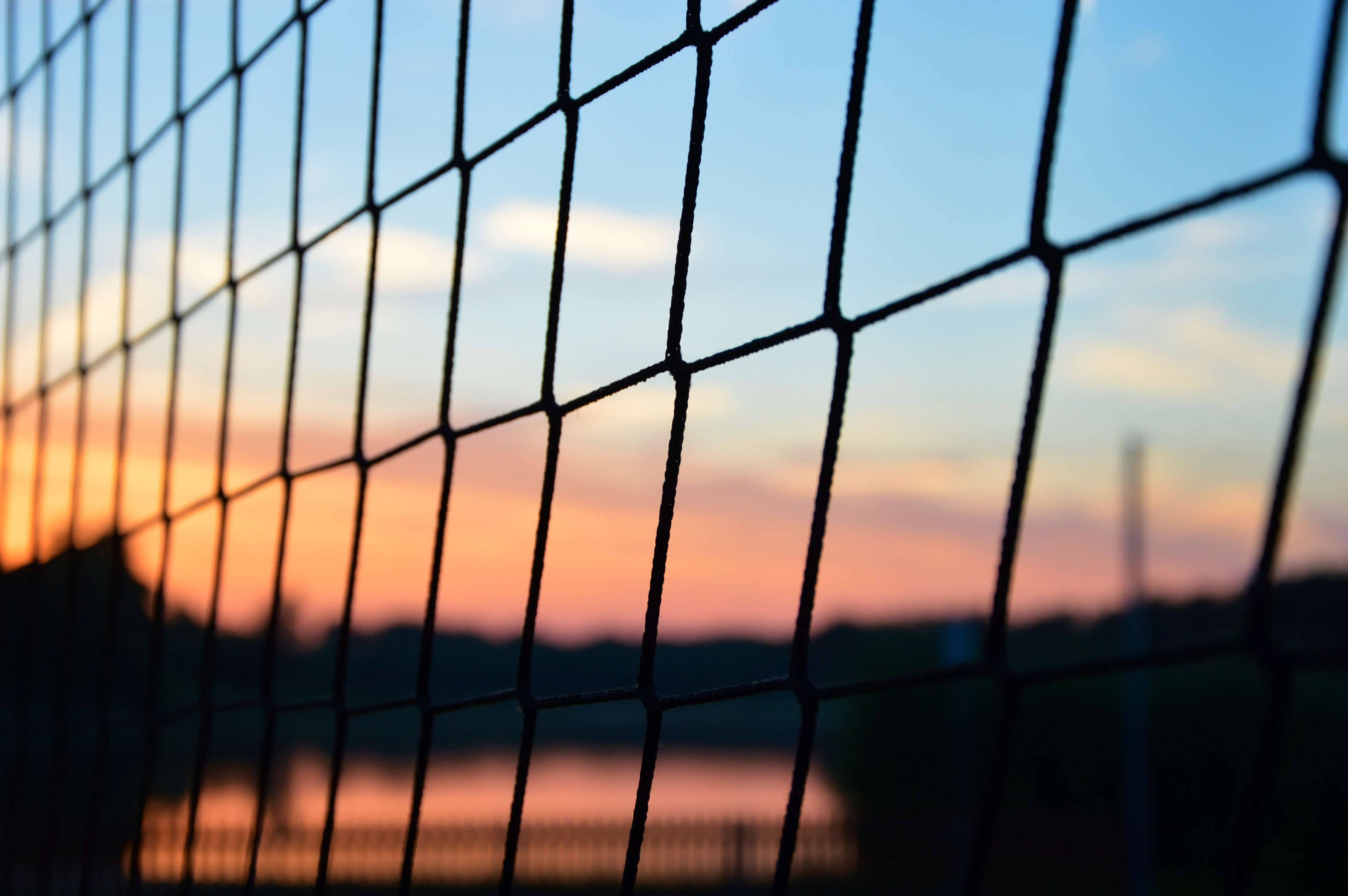 black net, soft sunset sky, orange and blue hues, 4K Desktop Wallpaper